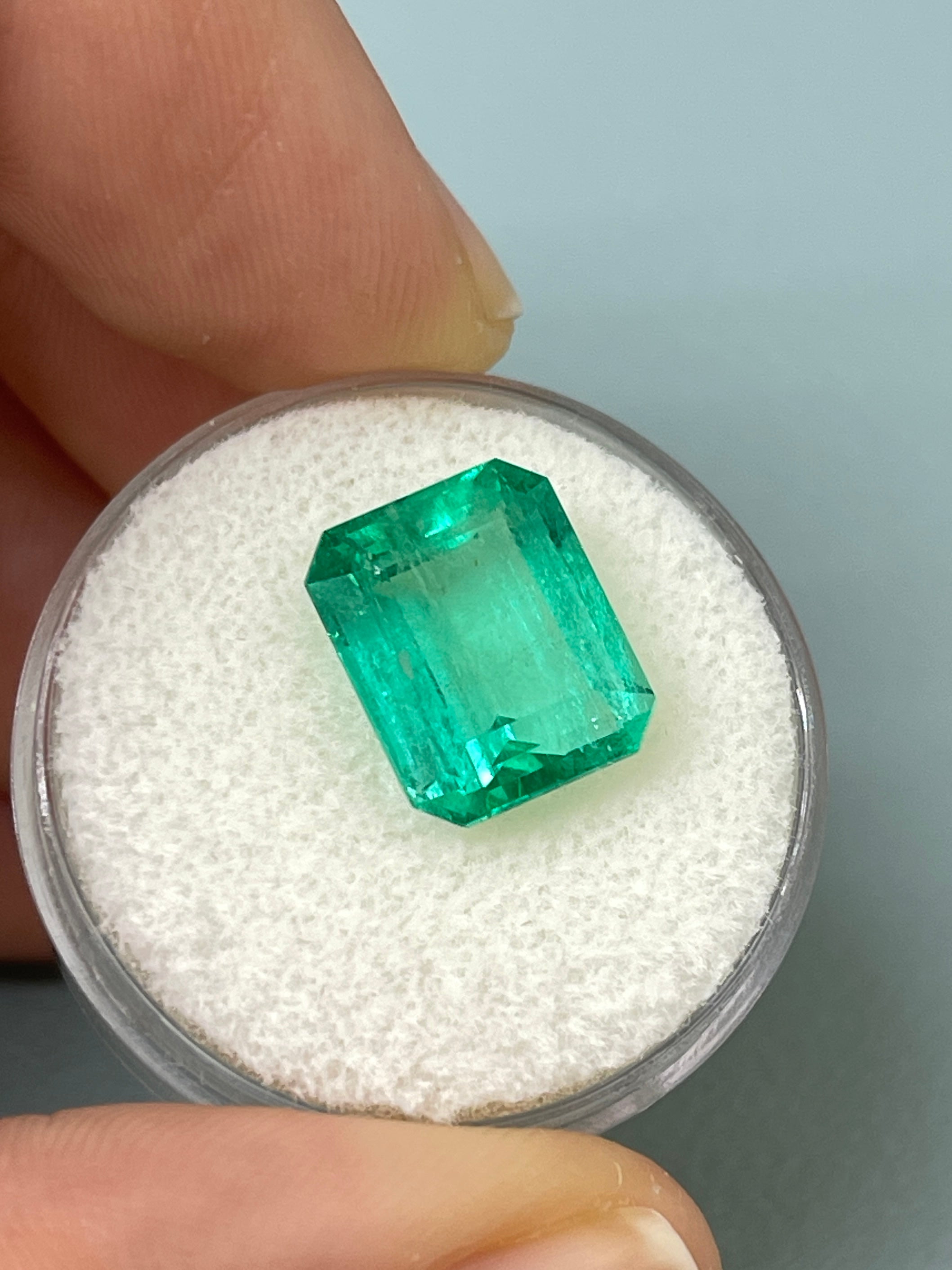 Medium green 5.50 carat Colombian emerald loose gemstone in classic emerald cut, from JR Colombian Emeralds.