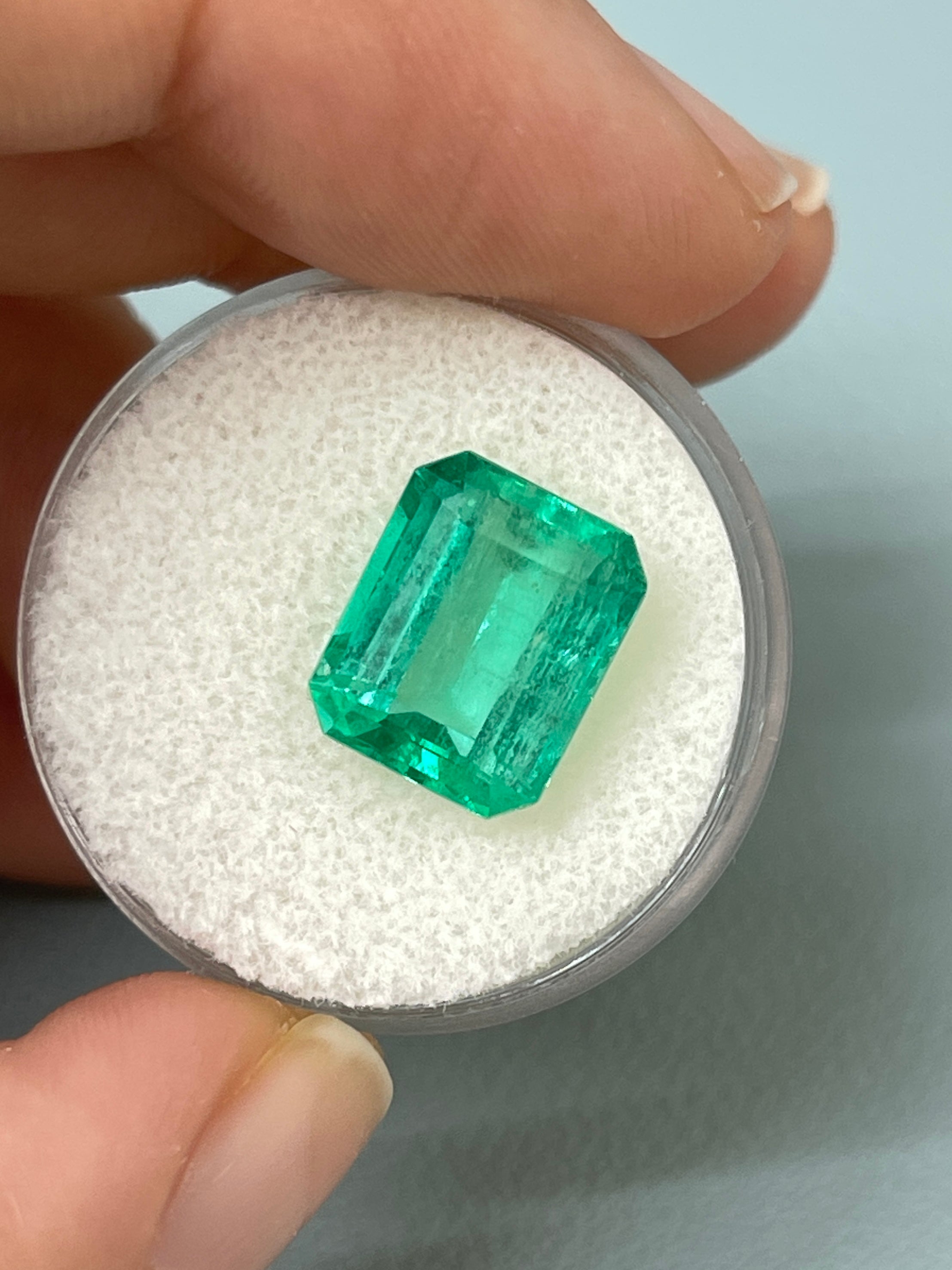 Medium green 5.50 carat Colombian emerald loose gemstone in classic emerald cut, from JR Colombian Emeralds.