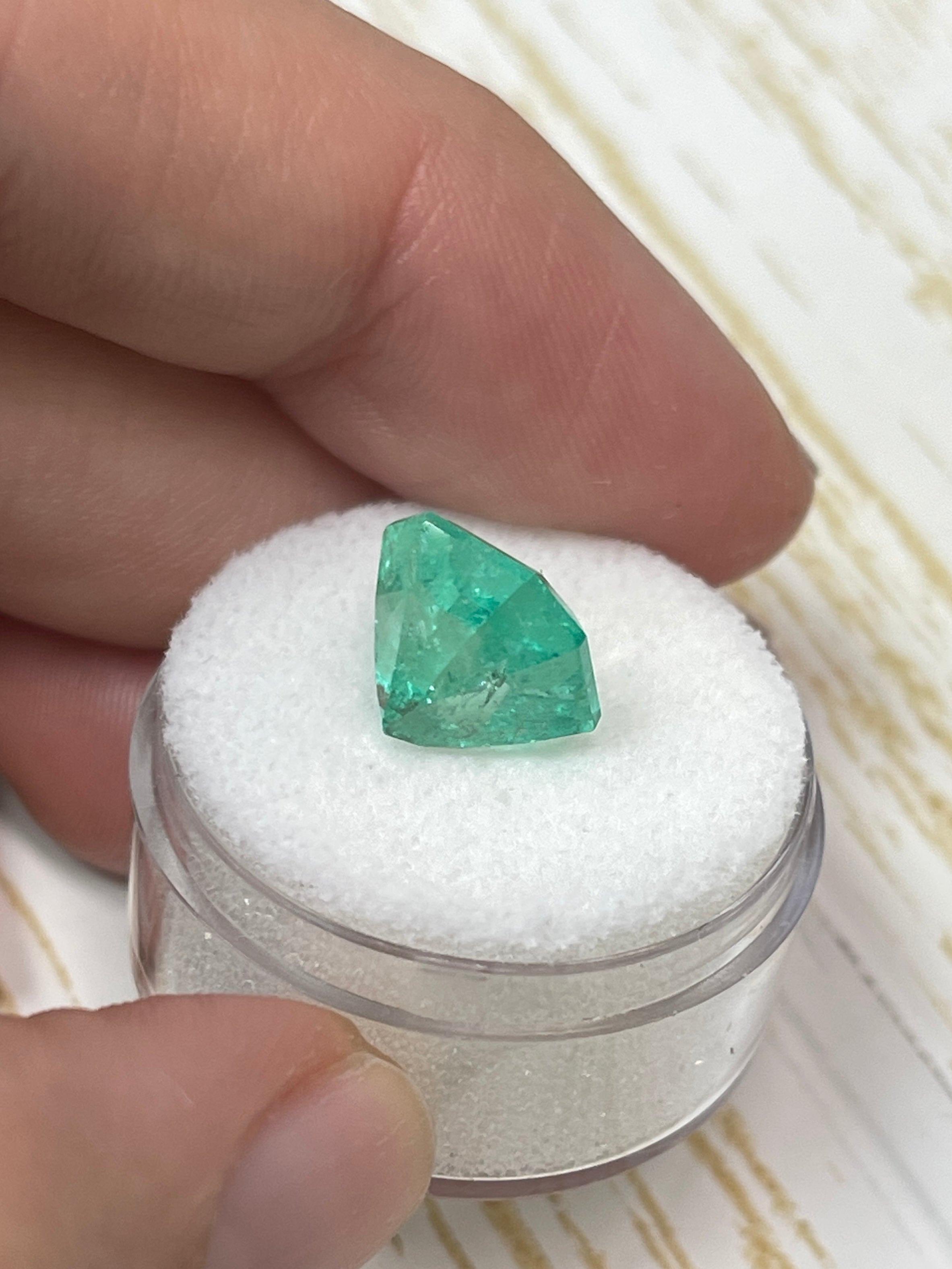 5.56 carat natural Colombian emerald loose gemstone in Asscher cut, vibrant spring green color, from JR Colombian Emeralds.