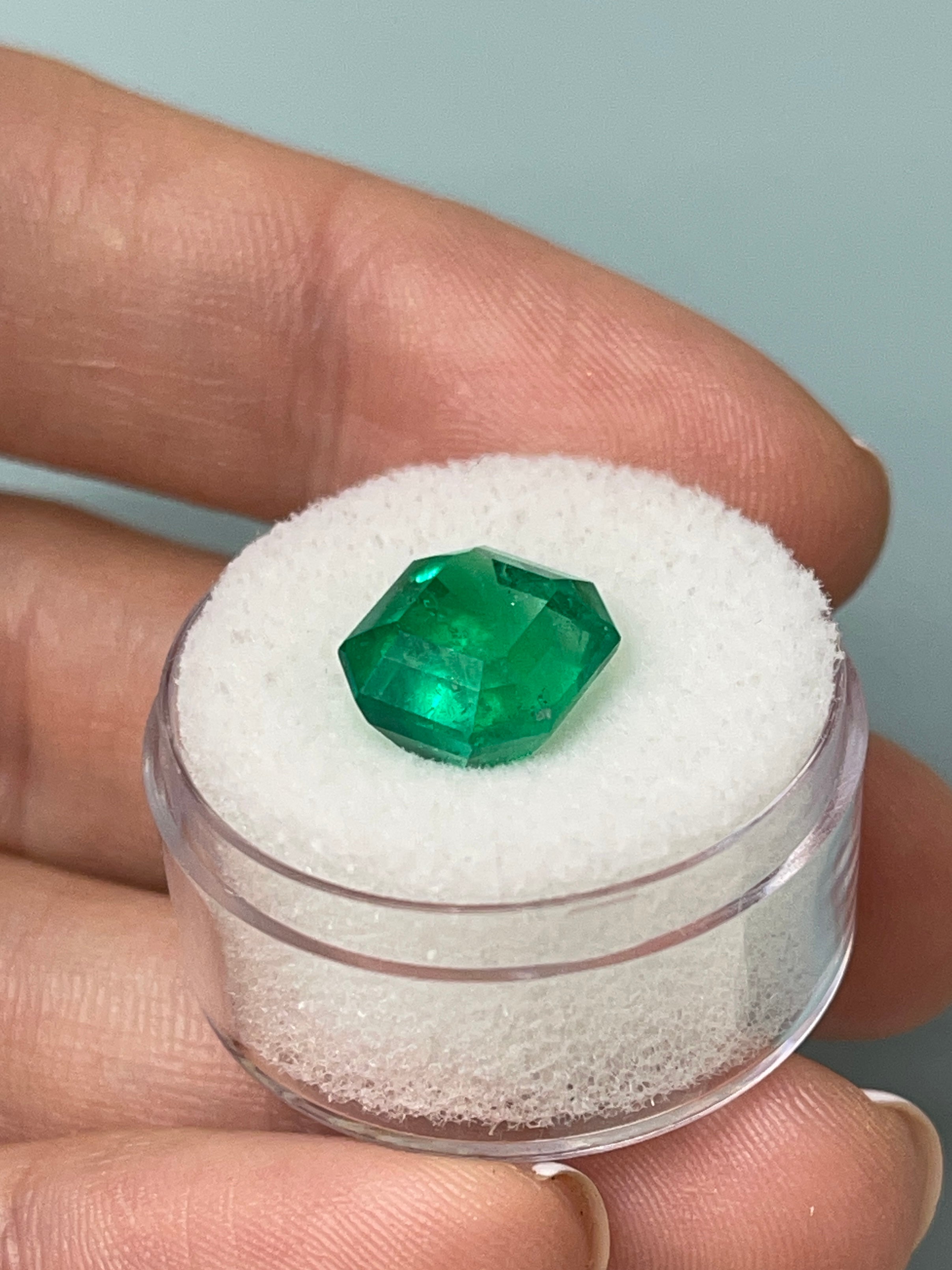 5.56 carat AAA Vivid Muzo Colombian Emerald in emerald cut, natural loose gemstone from JR Colombian Emeralds.