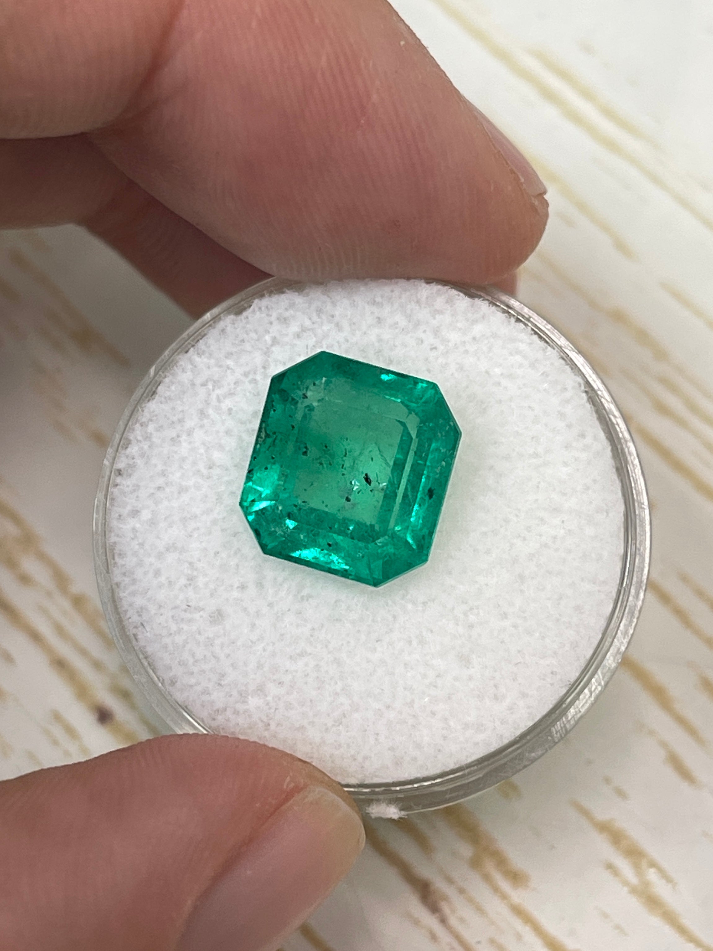 Natural 5.72 carat Colombian emerald loose gemstone with freckled forest inclusions, 11x10.5mm Asscher cut by JR Colombian Emeralds