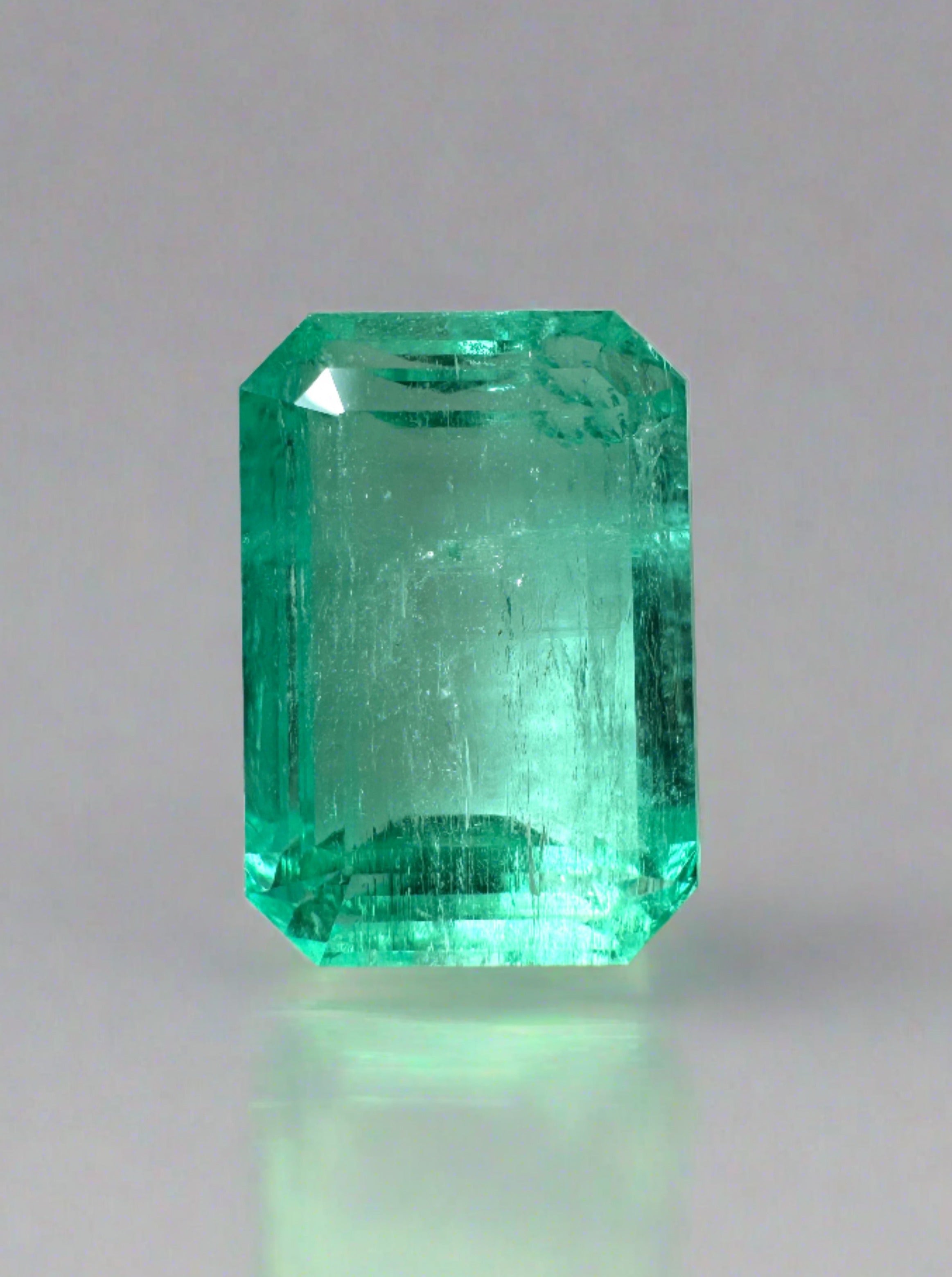 5.76 carat natural Colombian emerald loose gemstone, 12x8 mm emerald cut, vibrant clear green color, by JR Colombian Emeralds.