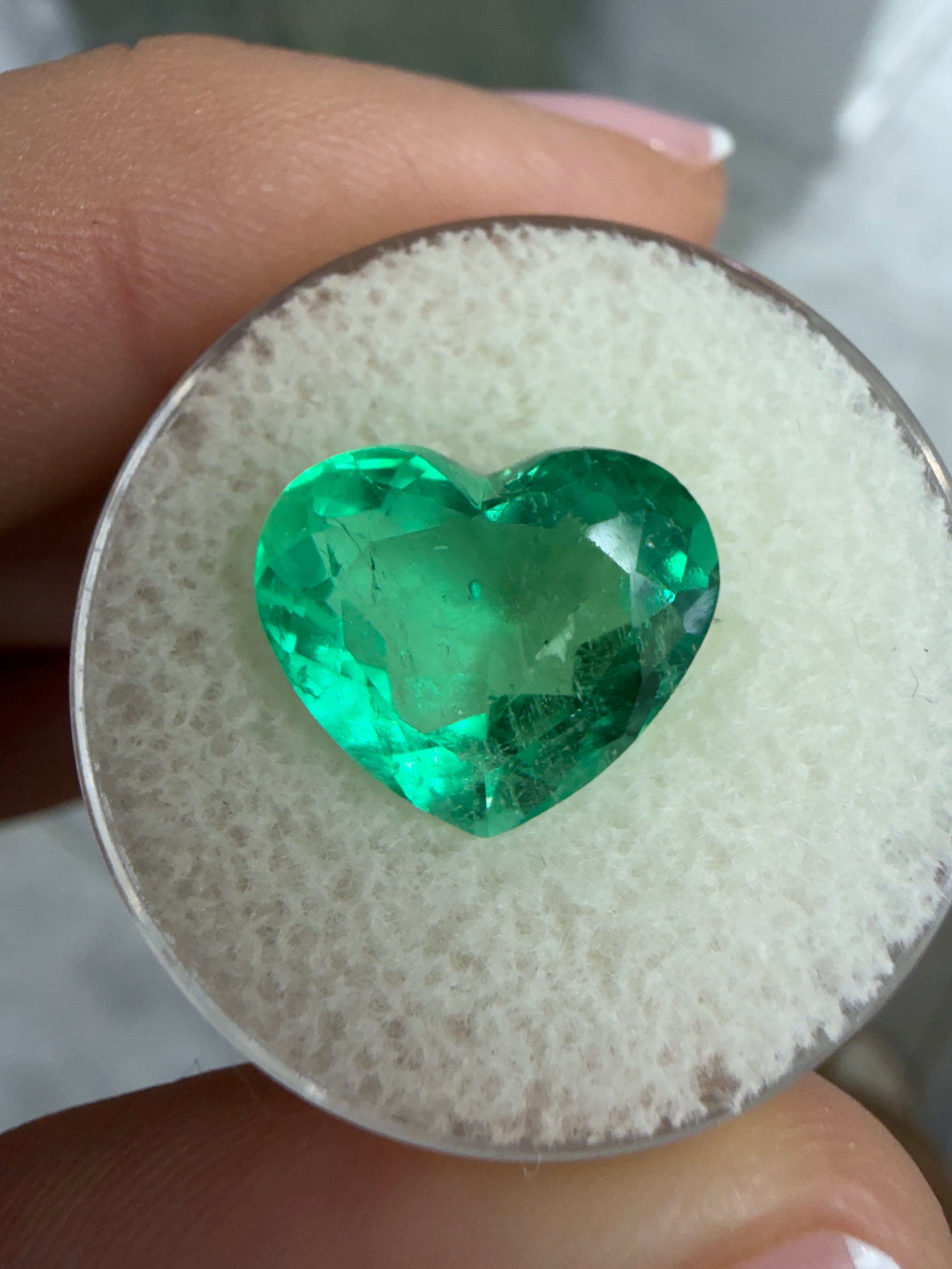 5.87 Carat vivacious green natural Colombian emerald loose gemstone in heart cut, 11x13mm, from JR Colombian Emeralds.