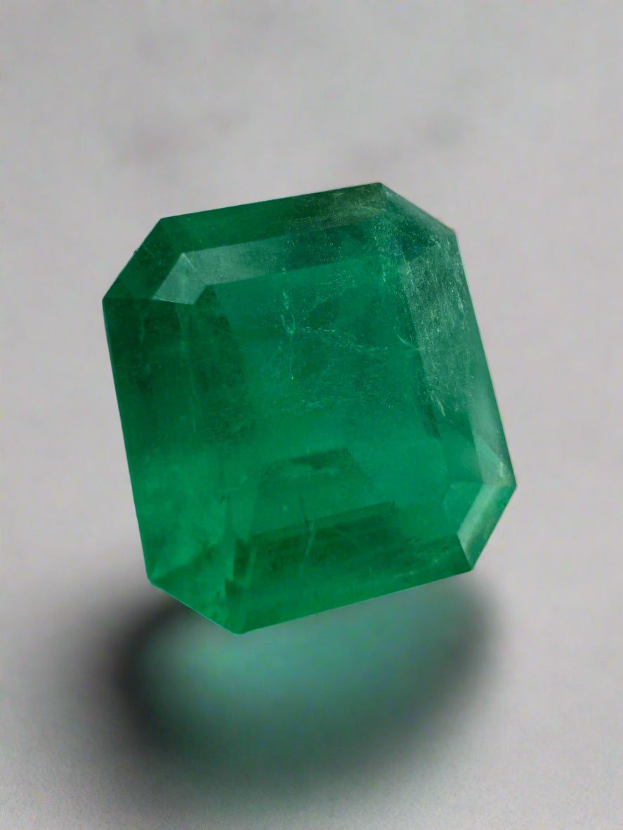 Deep green 12x11mm Colombian emerald loose gemstone, 5.94 carats, emerald cut, natural and high-quality from JR Colombian Emeralds.