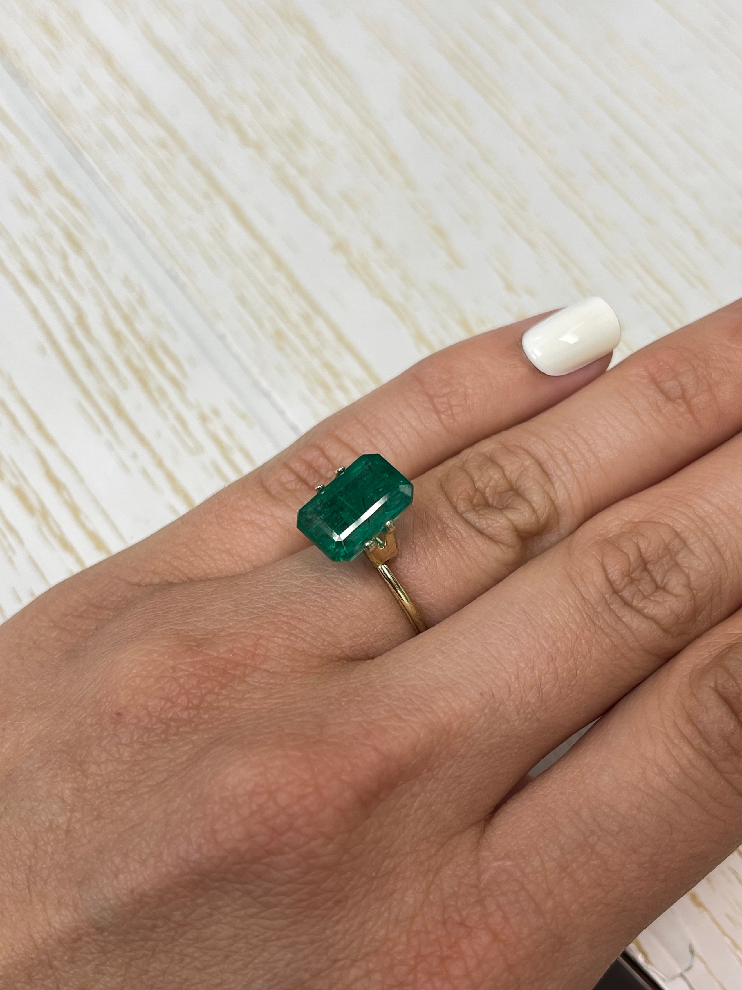 Vivid green 5.97 carat natural Zambian emerald cut loose gemstone from JR Colombian Emeralds, 13x9 mm size.