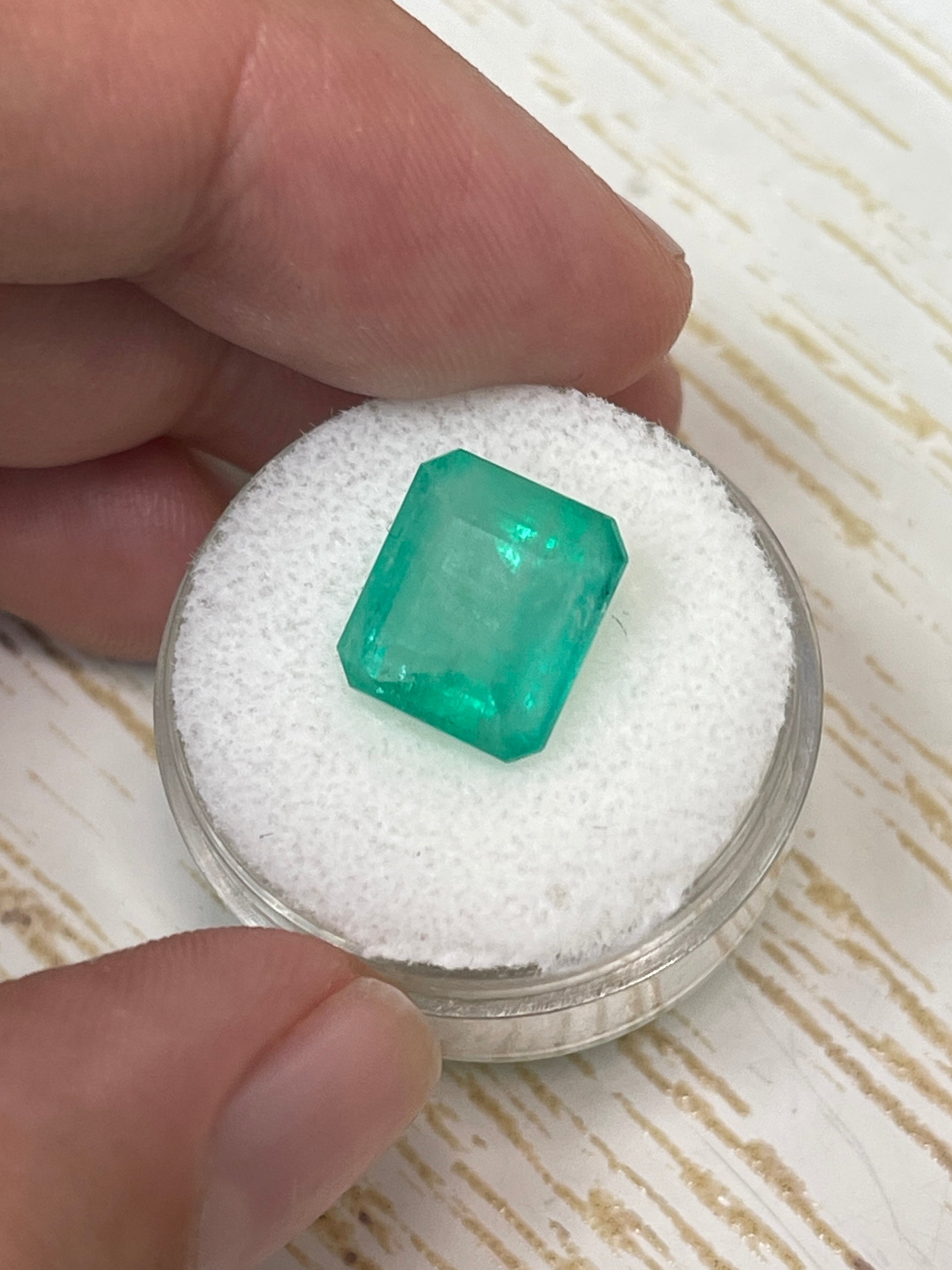 6.13 carat natural Colombian emerald loose gemstone, emerald cut, pastel green earthy tone, from JR Colombian Emeralds