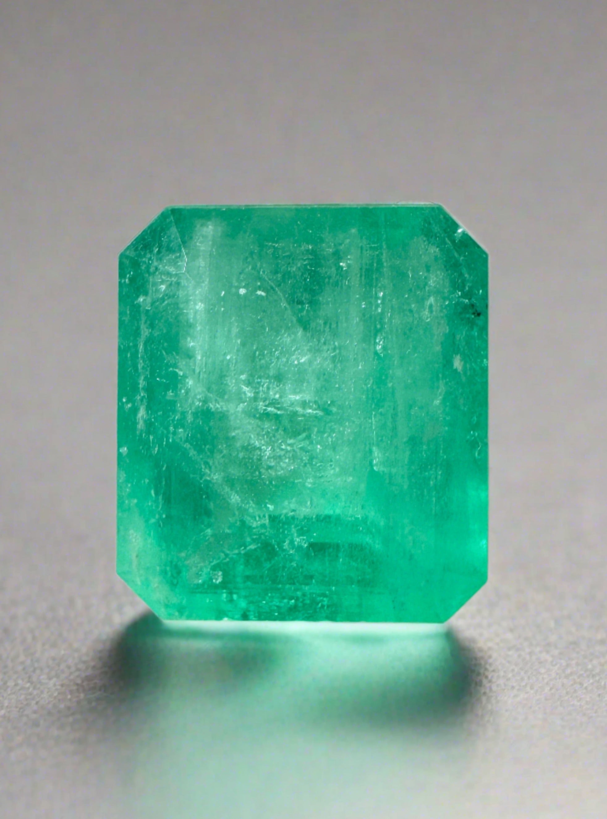 Natural loose Colombian emerald, 6.13 carats, earthy pastel green, emerald cut, from JR Colombian Emeralds.