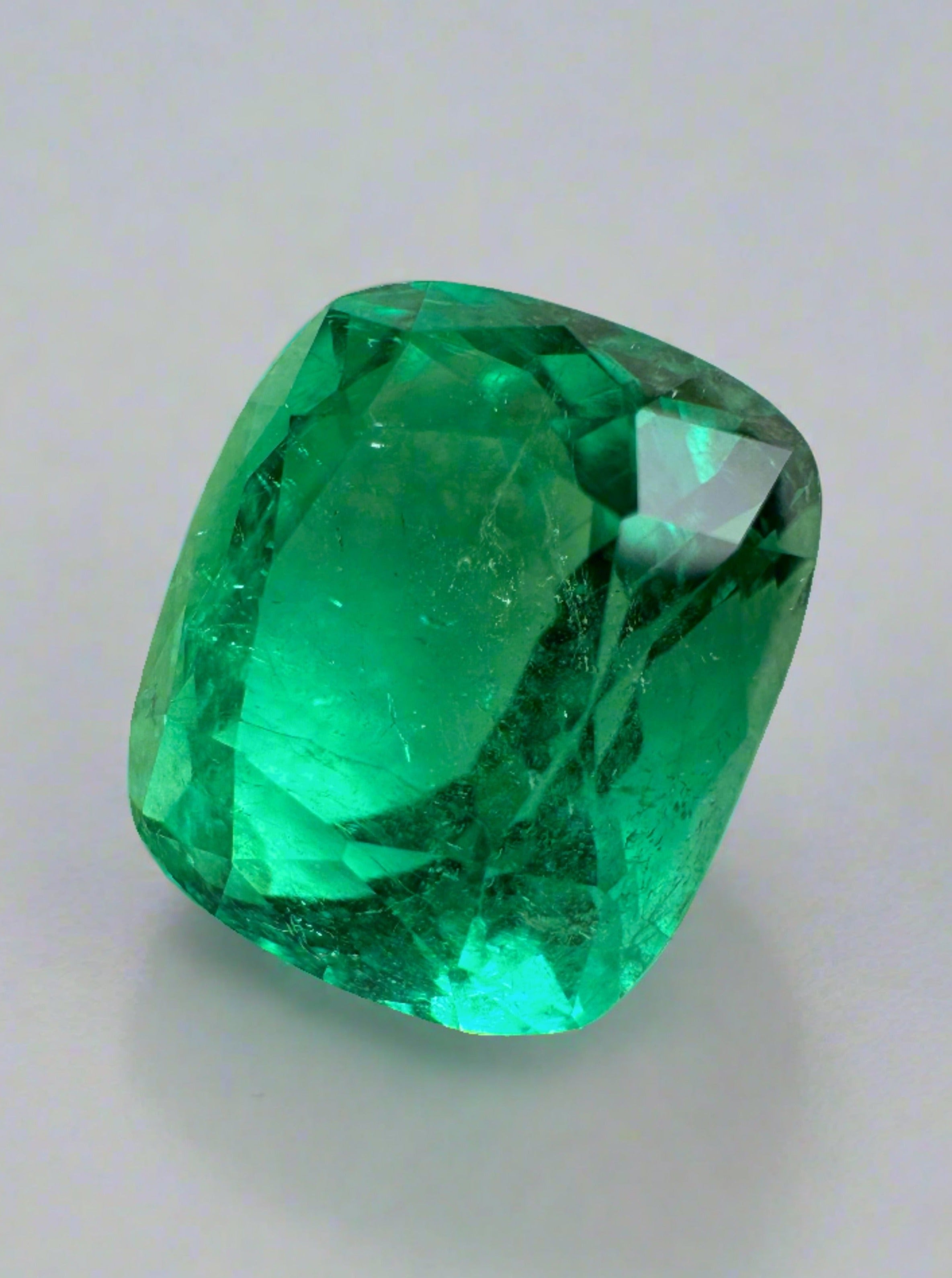 Natural emerald loose gemstone, 6.17 carats, cushion cut, intense green Colombian emerald with minor to moderate oil treatment.