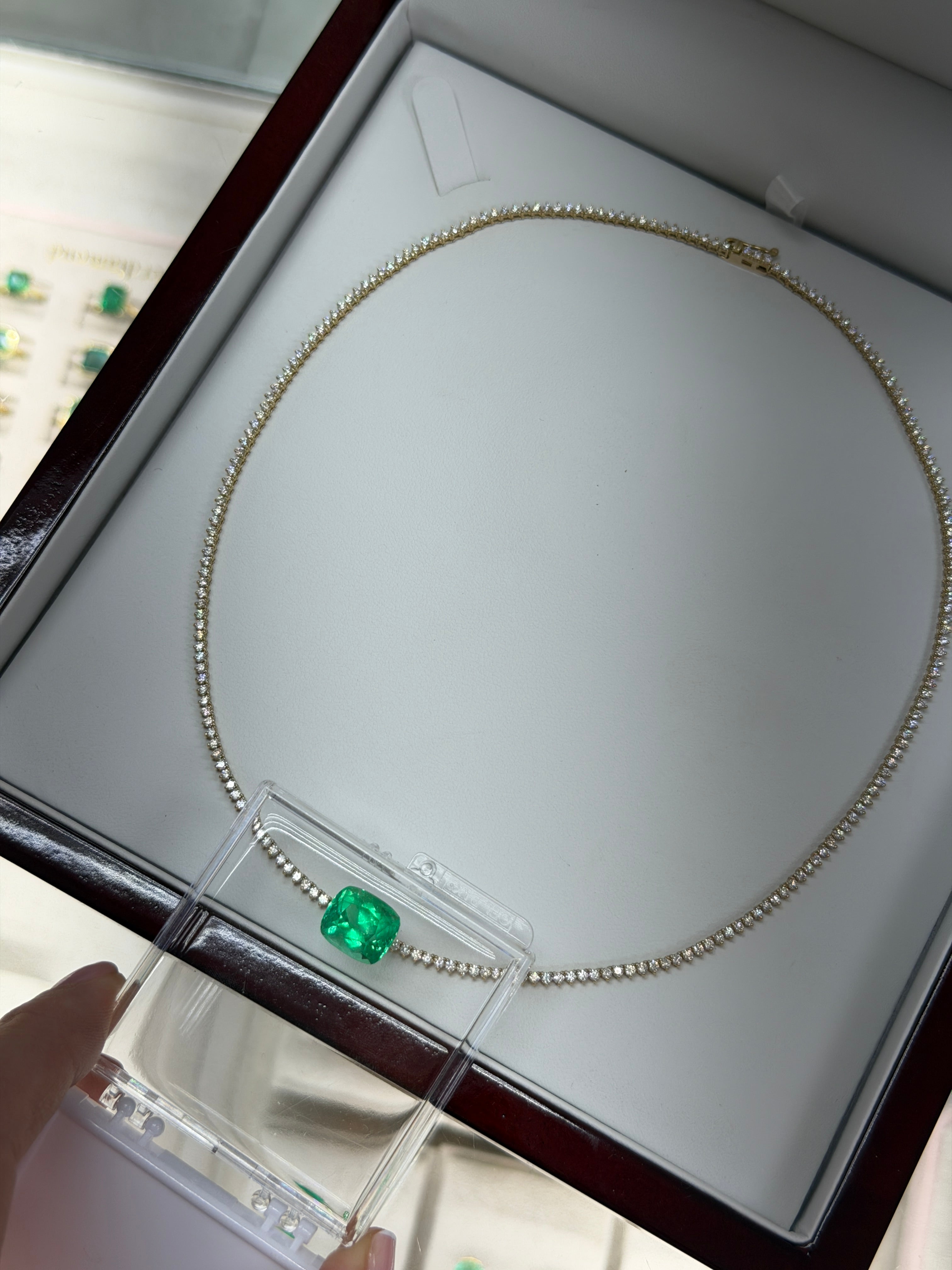 Natural Colombian emerald loose gemstone, 6.17 carats, cushion cut, intense green, minor to moderate oil treatment, by JR Colombian Emeralds.