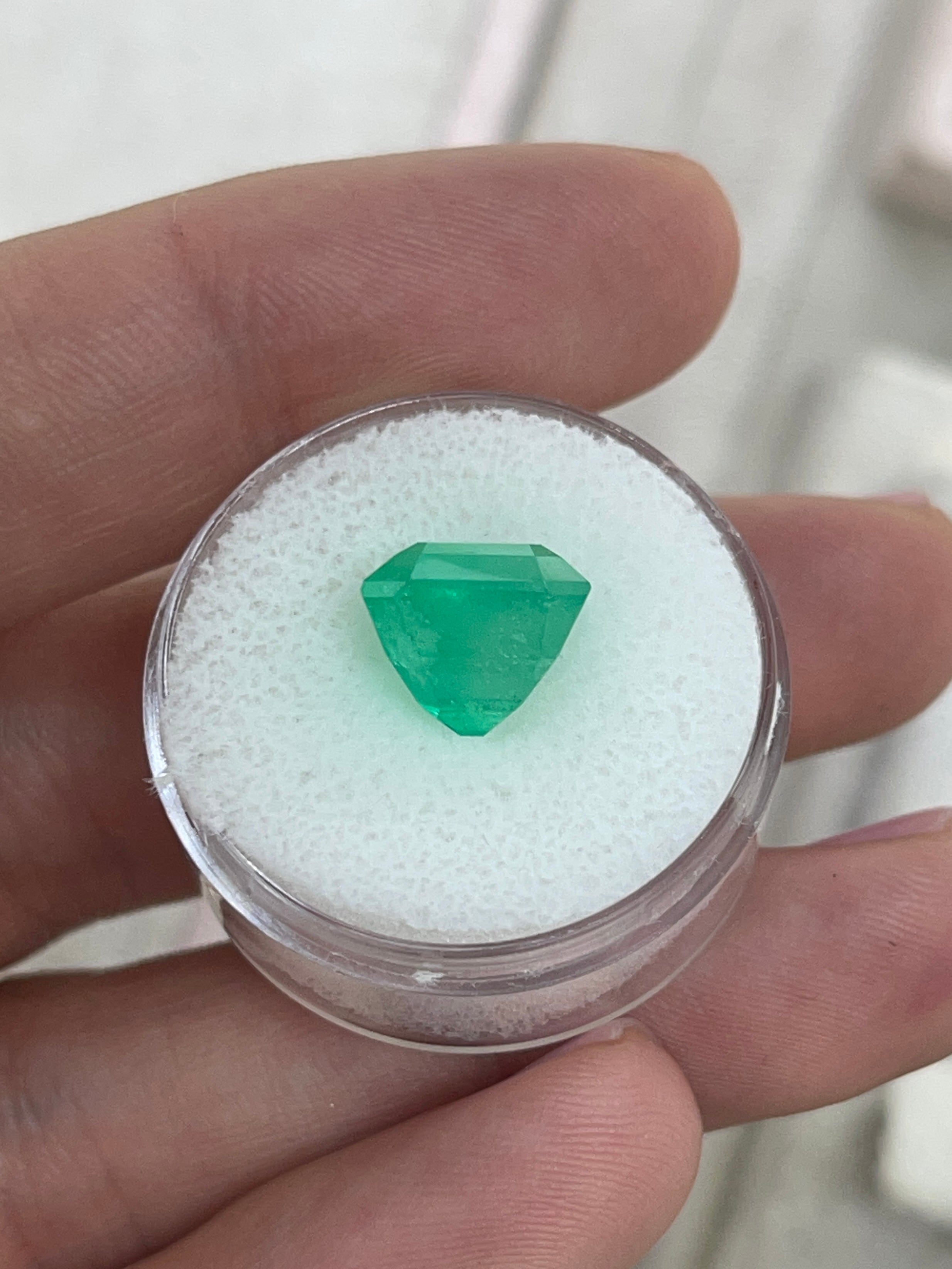 Medium neon yellowish Colombian emerald in 10x10 Asscher cut, 6.19 carats, loose gemstone from JR Colombian Emeralds.