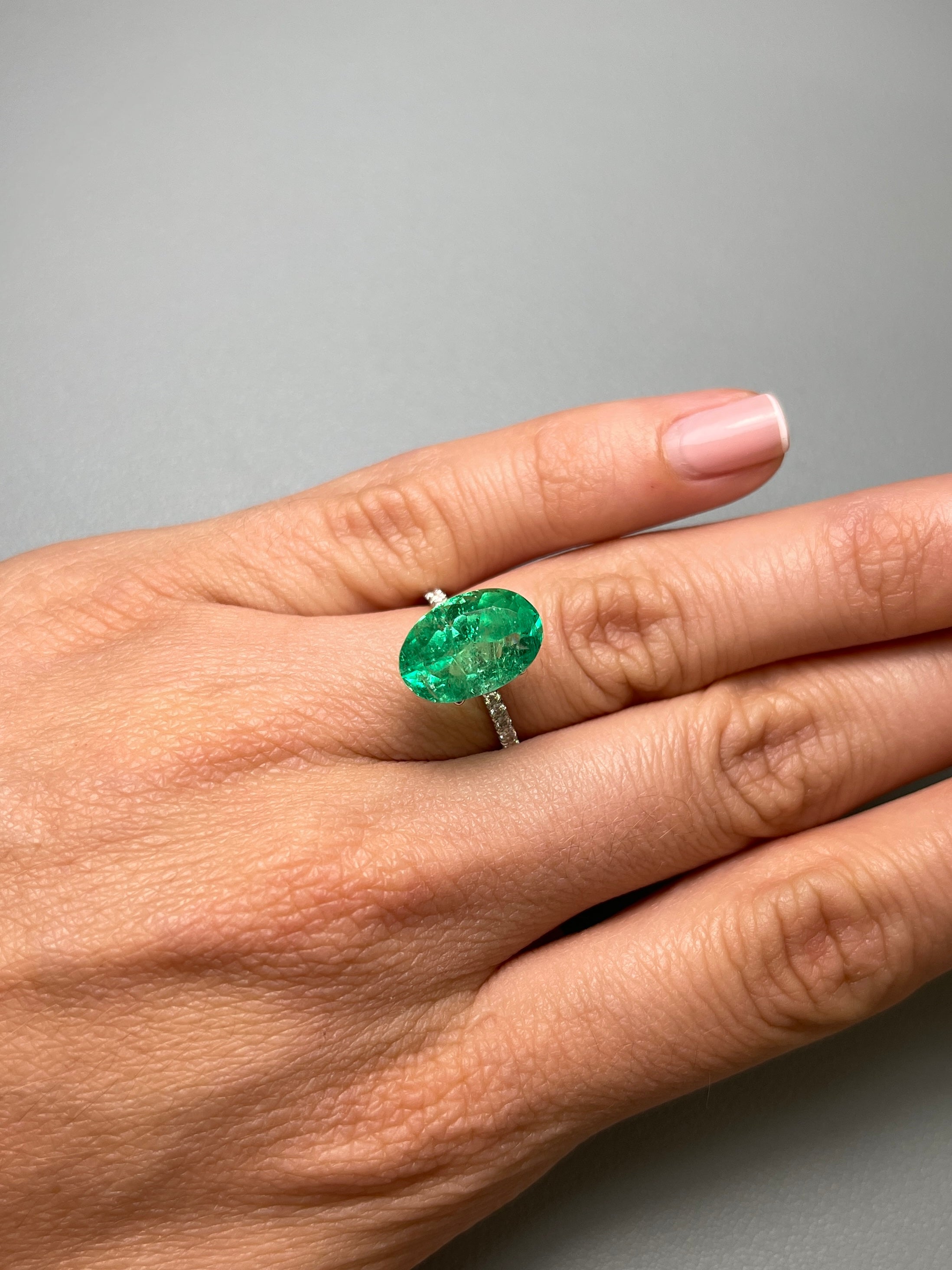 6.23 Carat Elongated Yellowish Green Natural Loose Colombian Emerald-Oval Cut - JR Colombian Emeralds