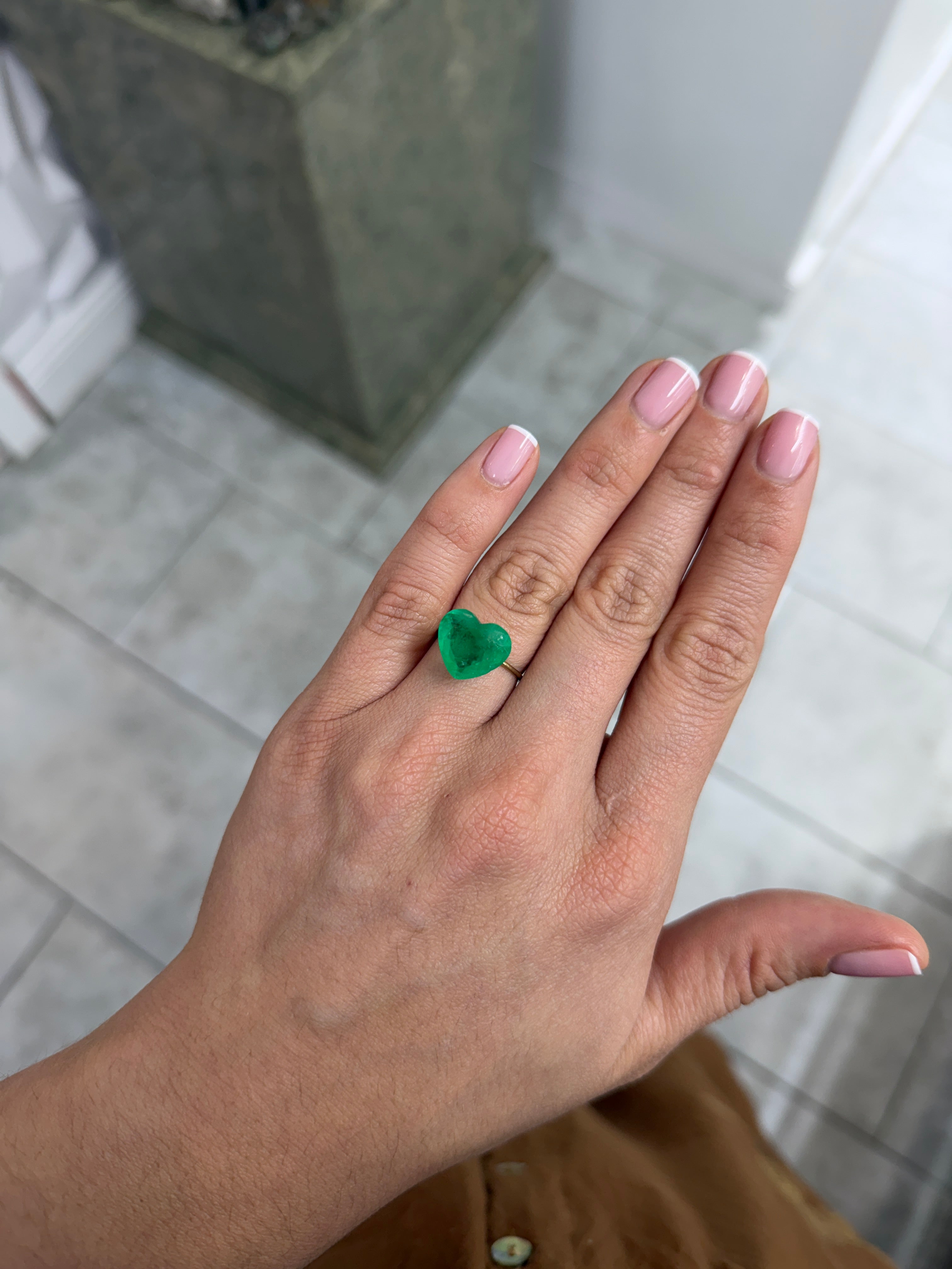 Medium green Colombian emerald loose gemstone, 12x13.5mm heart cut, 6.35 carats, from JR Colombian Emeralds.