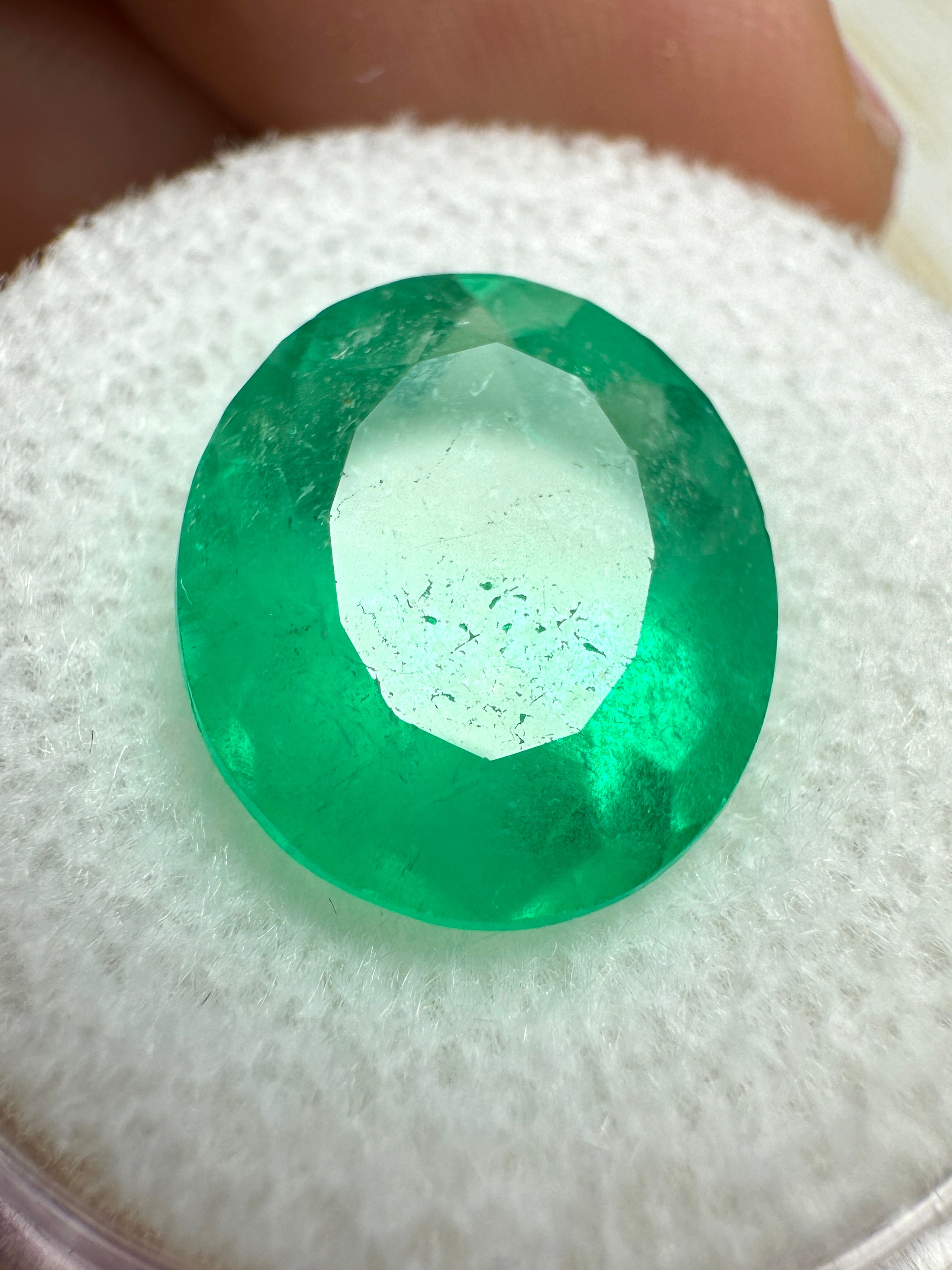 Neon green 6.35 carat oval-cut natural Colombian emerald loose gemstone from JR Colombian Emeralds.