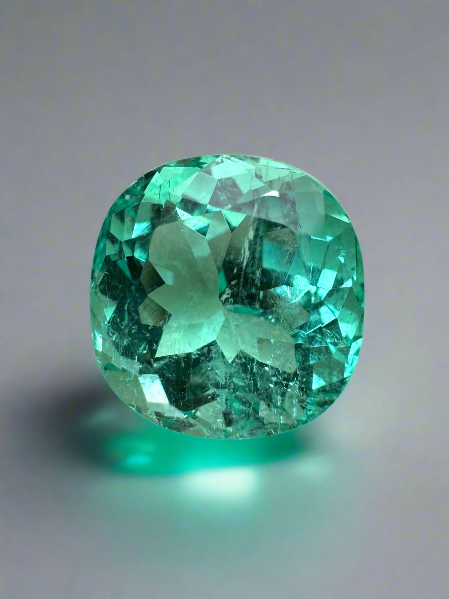 Luminous bluish green 6.38 carat natural Colombian emerald in cushion cut, loose gemstone with vibrant color and clarity.