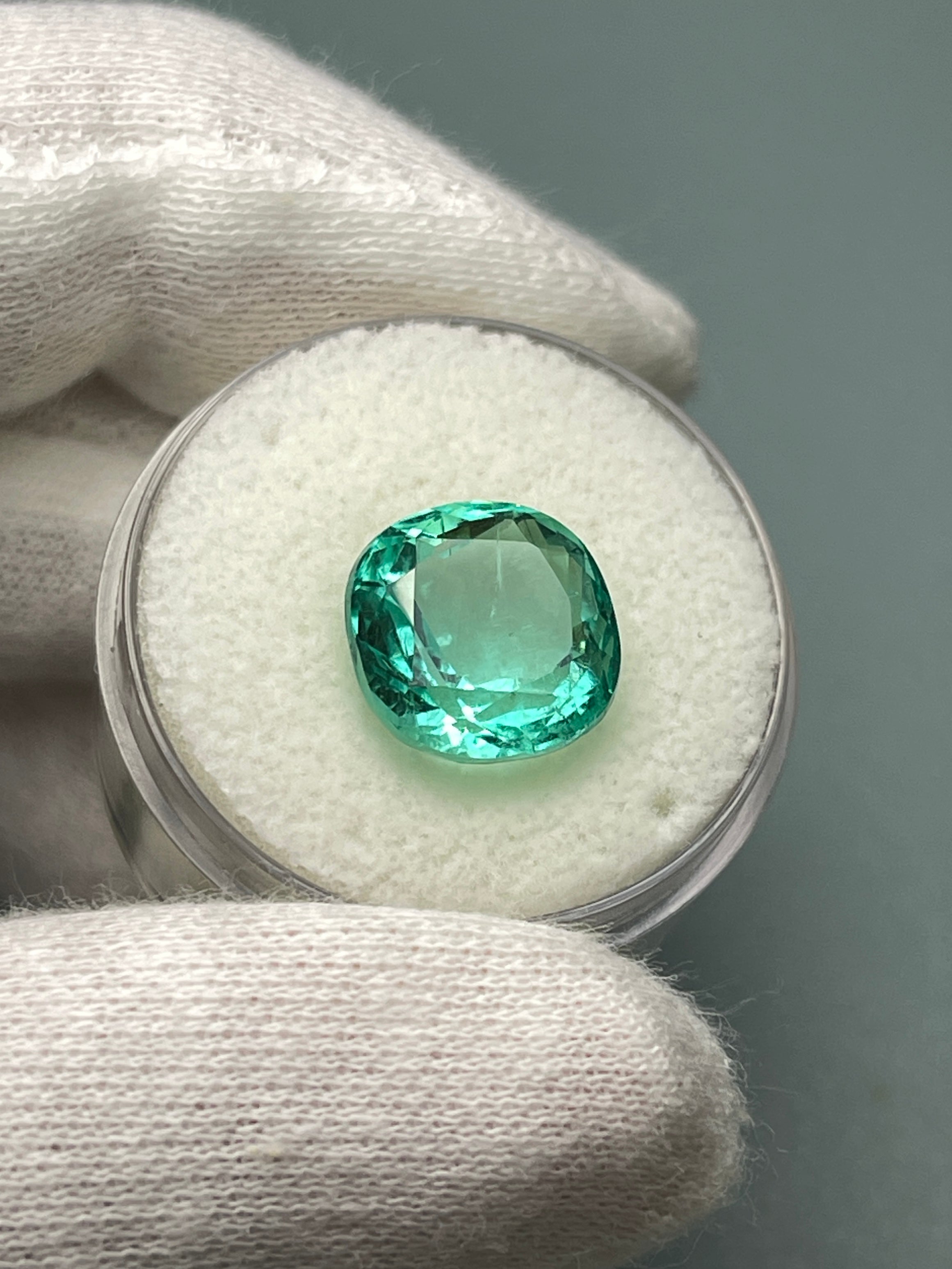 Luminous bluish green 6.38 carat natural Colombian emerald in cushion cut, loose gemstone from JR Colombian Emeralds.