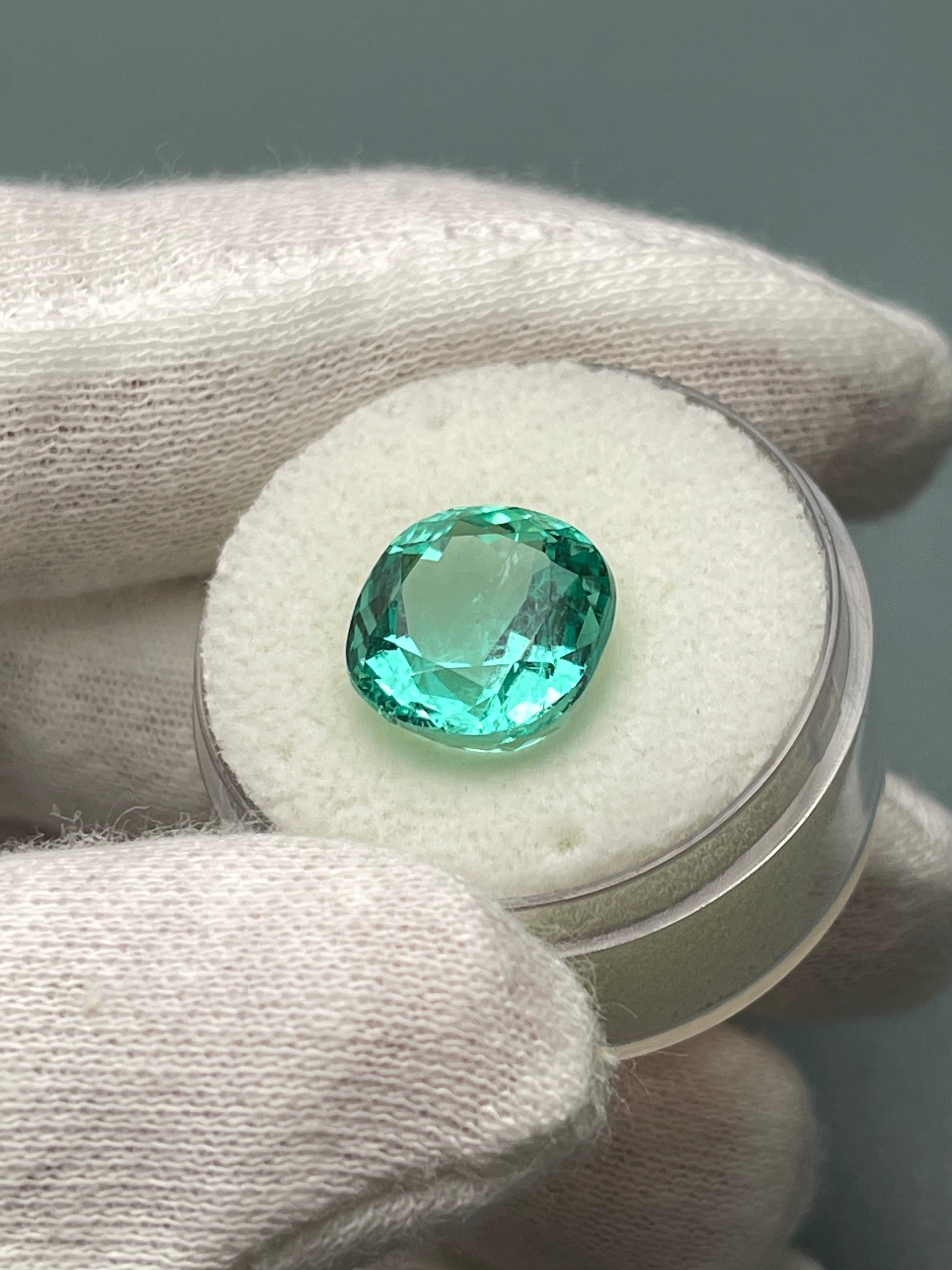 Luminous bluish-green 6.38 carat natural Colombian emerald in cushion cut, loose gemstone from JR Colombian Emeralds.