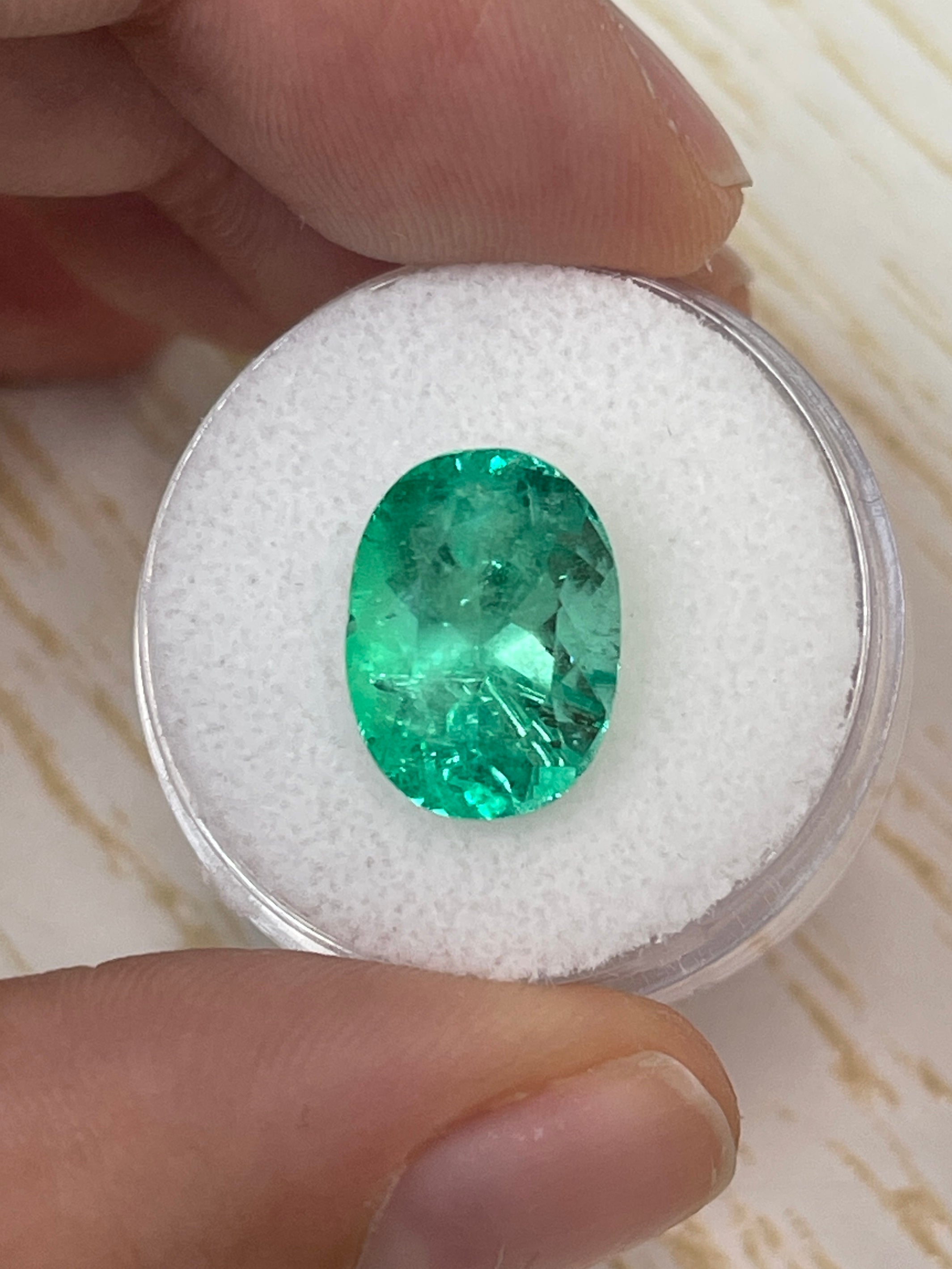 Medium green 6.40 carat natural Colombian emerald loose oval cut gemstone from JR Colombian Emeralds.