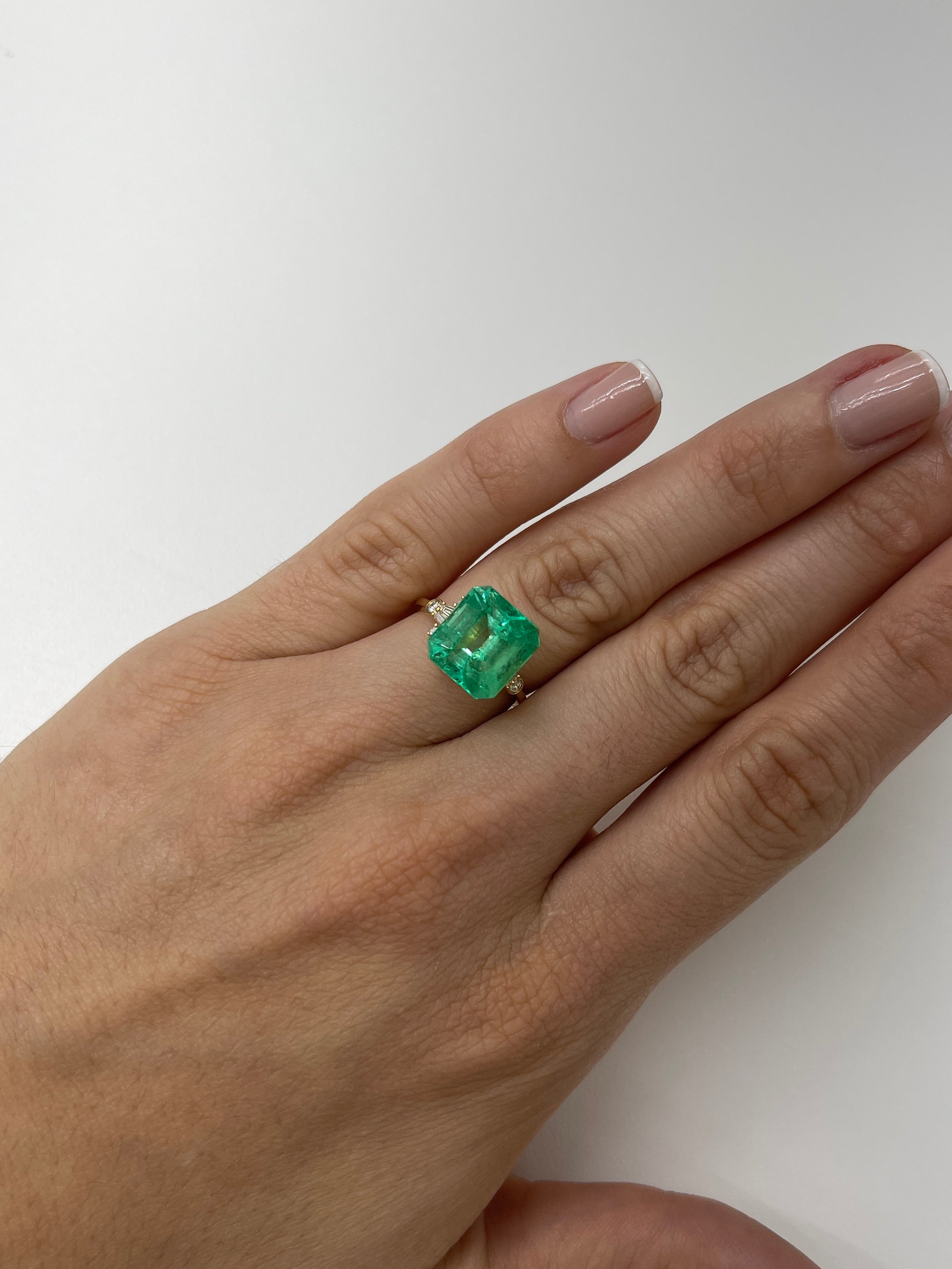 Yellowish green 6.50 carat natural Colombian emerald in Asscher cut, loose gemstone from JR Colombian Emeralds.