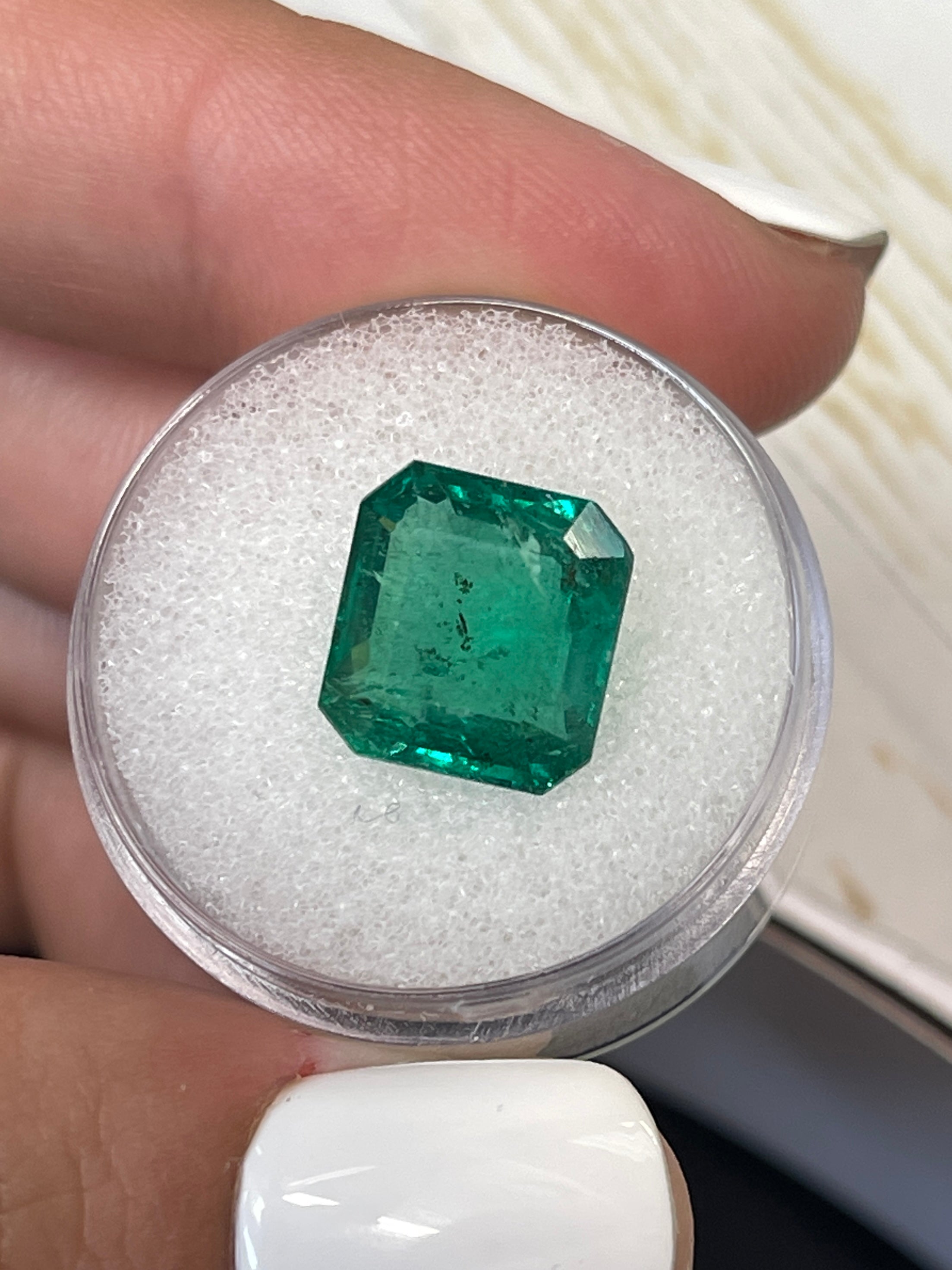 Natural 6.54 carat medium deep green Zambian emerald cut loose gemstone by JR Colombian Emeralds.
