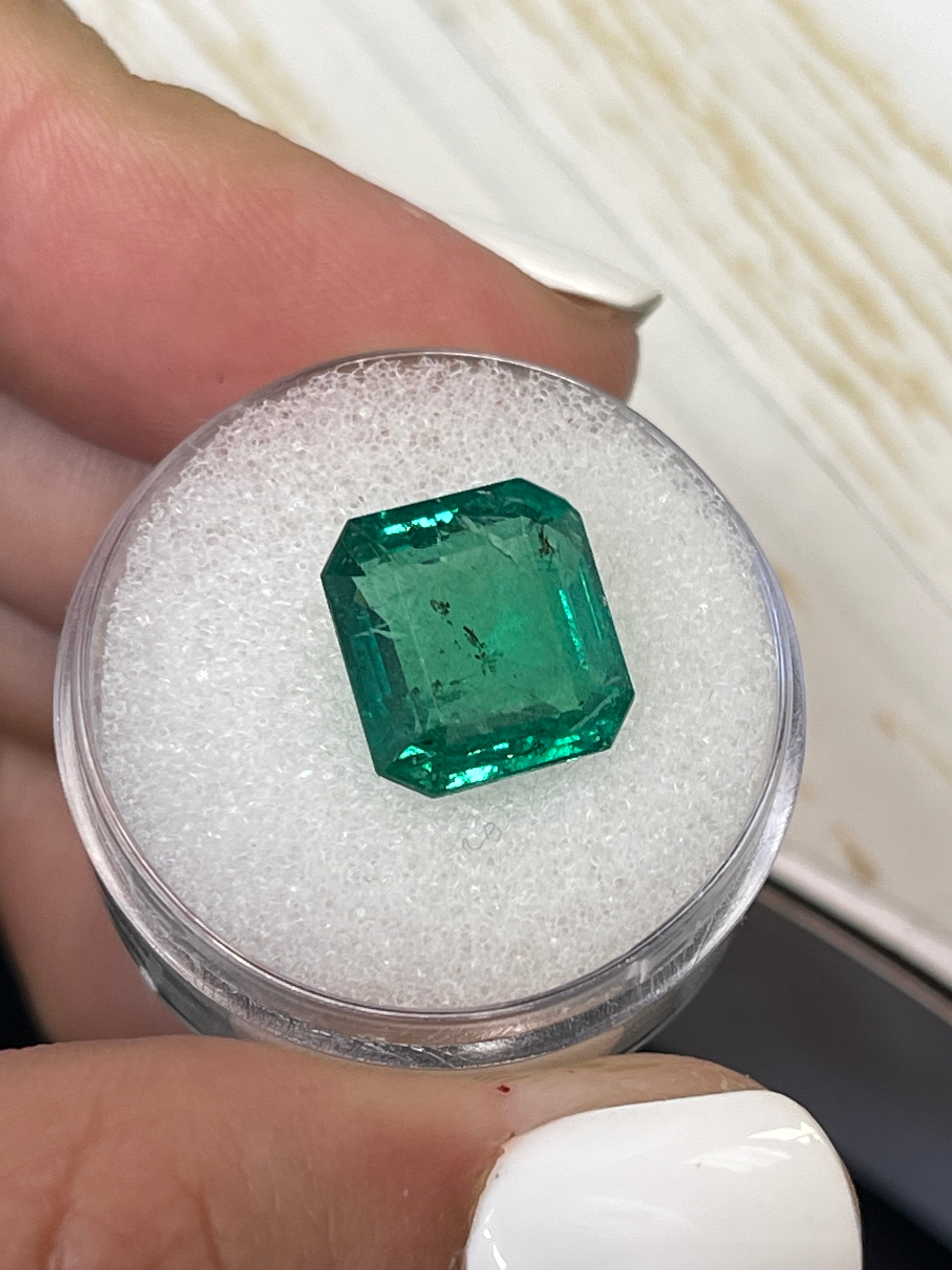 Medium deep green 6.54 carat natural Zambian emerald cut loose gemstone by JR Colombian Emeralds.