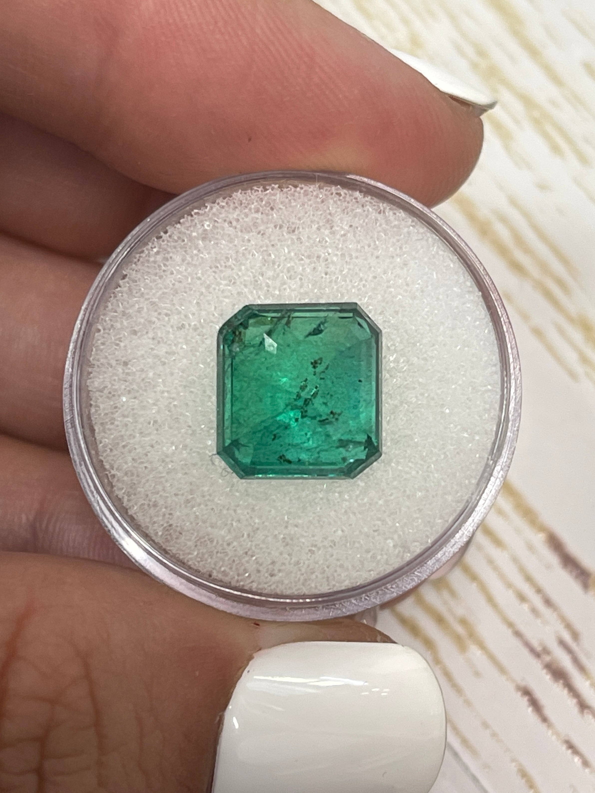 6.54-carat medium deep green natural loose Zambian emerald cut gemstone by JR Colombian Emeralds.