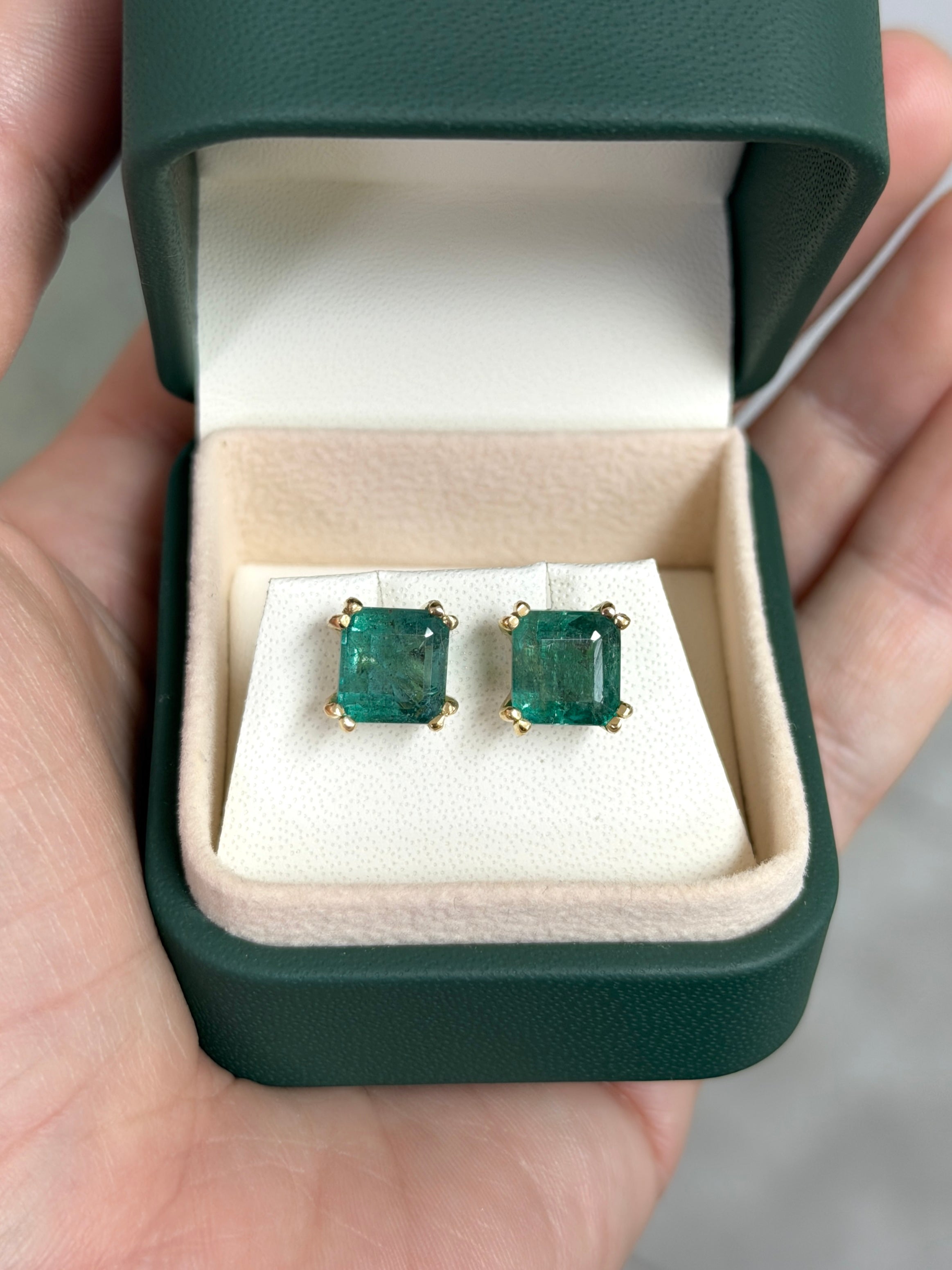 High grade 8x8mm Asscher cut natural emerald stud earrings with double prong setting in 18K gold by JR Colombian Emeralds.