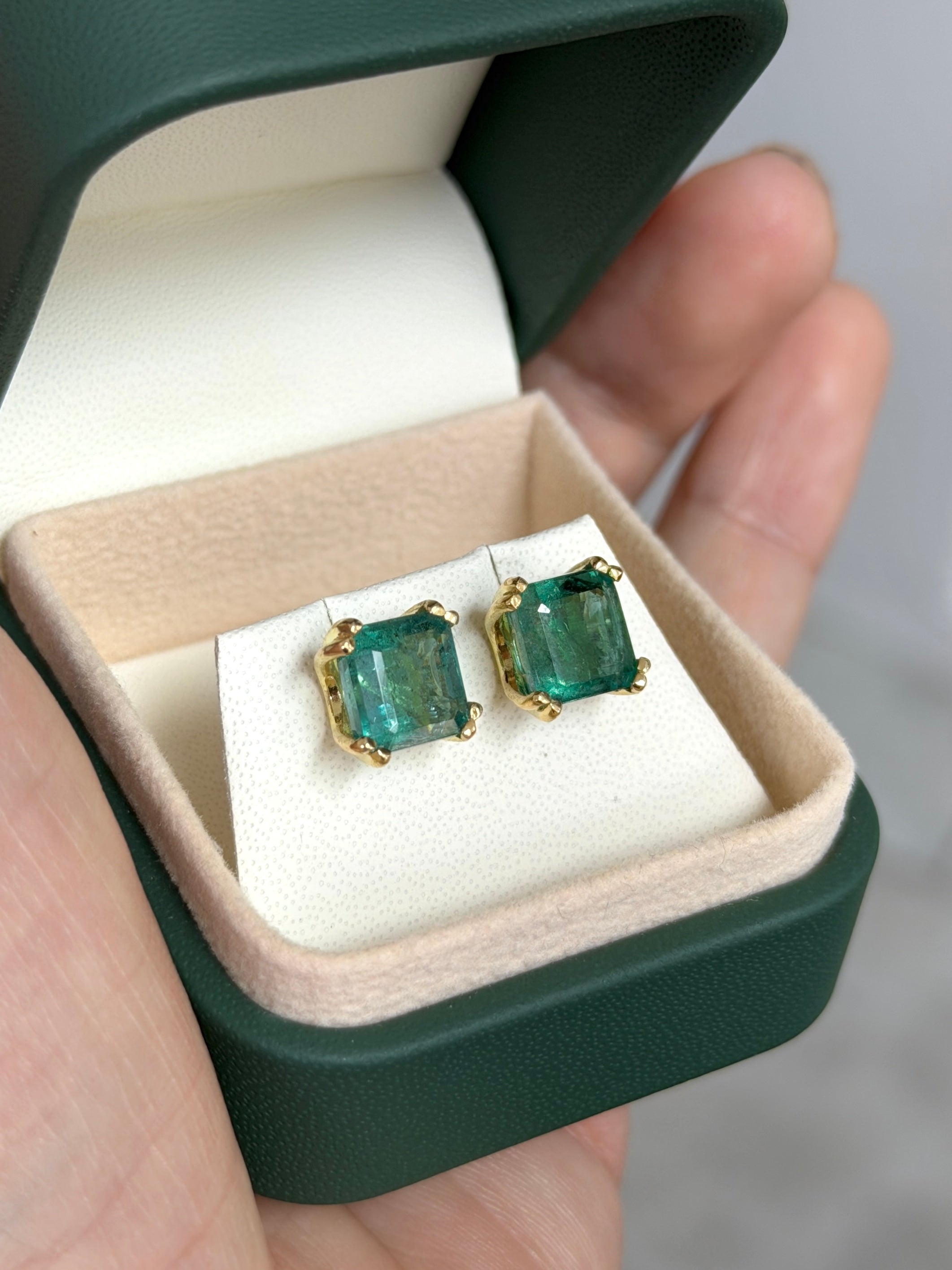 High grade 8x8 Asscher cut natural emerald double prong stud earrings in 18K gold, 6.70tcw from JR Colombian Emeralds.