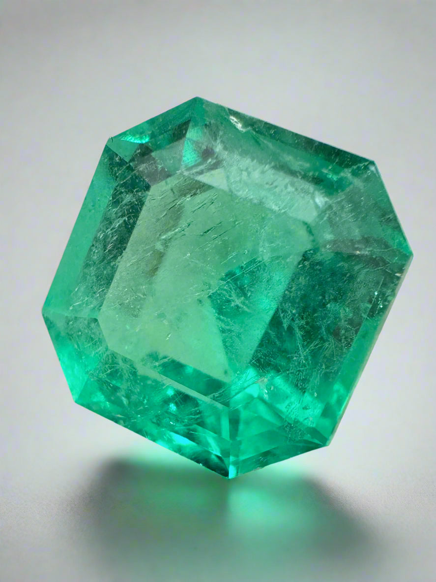 6.76 carat glowing green natural Colombian emerald loose Asscher cut gemstone from JR Colombian Emeralds.