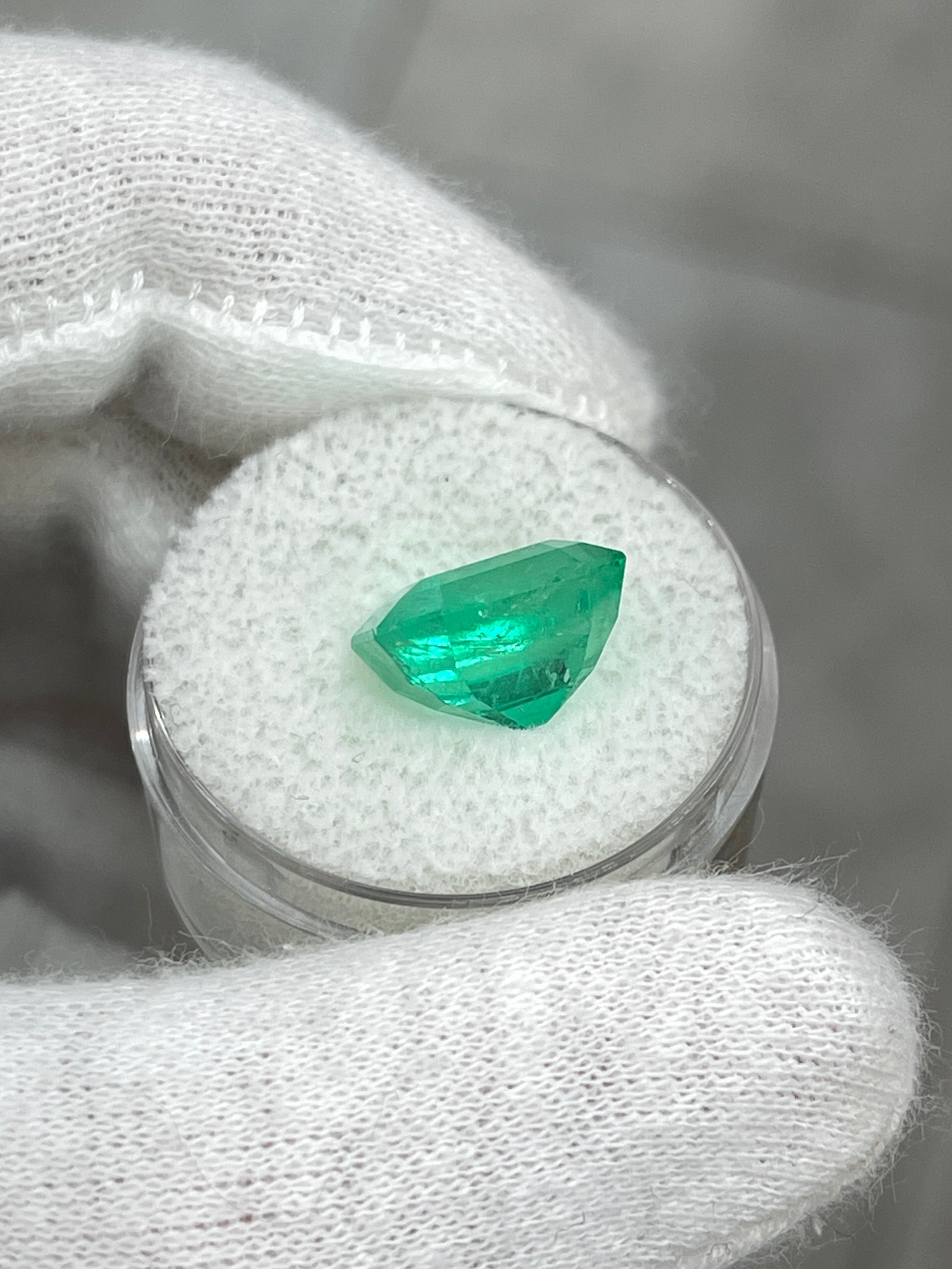 6.76 carat glowing green natural Colombian emerald in Asscher cut, loose gemstone from JR Colombian Emeralds.
