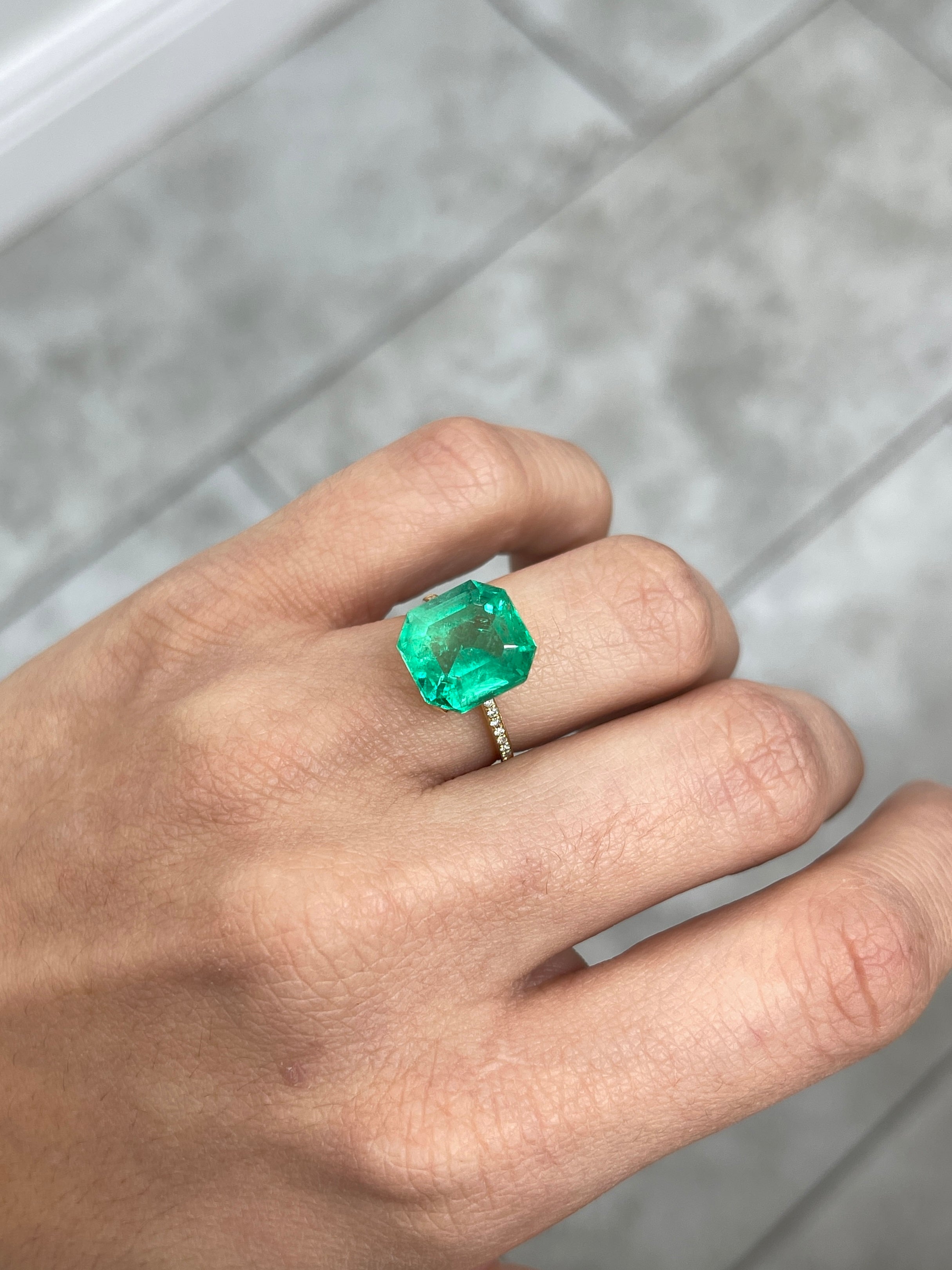 6.76 carat glowing green natural Colombian emerald loose Asscher cut gemstone by JR Colombian Emeralds.