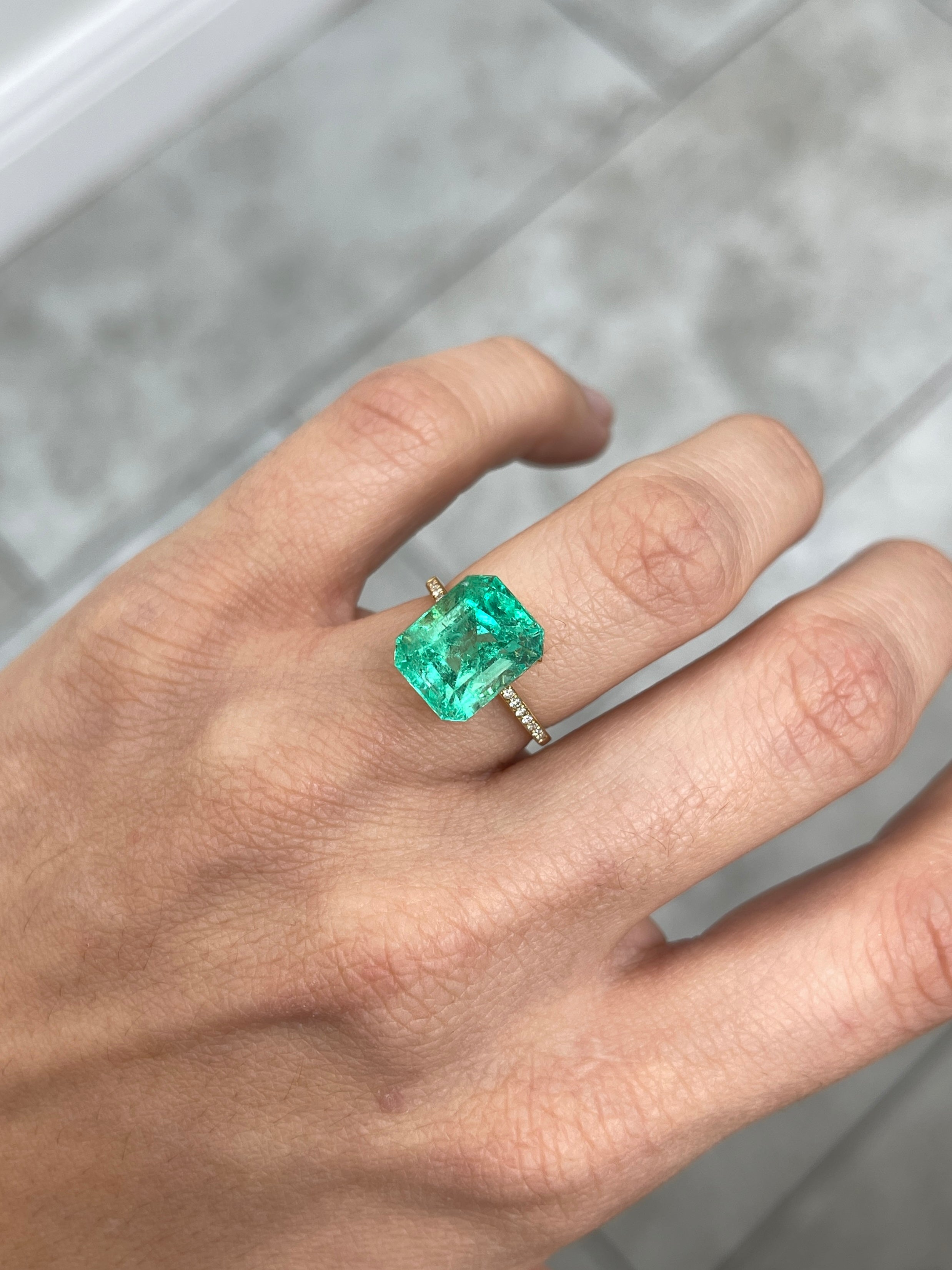 Luminous 6.79-carat natural Colombian emerald loose gemstone in classic emerald cut, ethically mined by JR Colombian Emeralds.