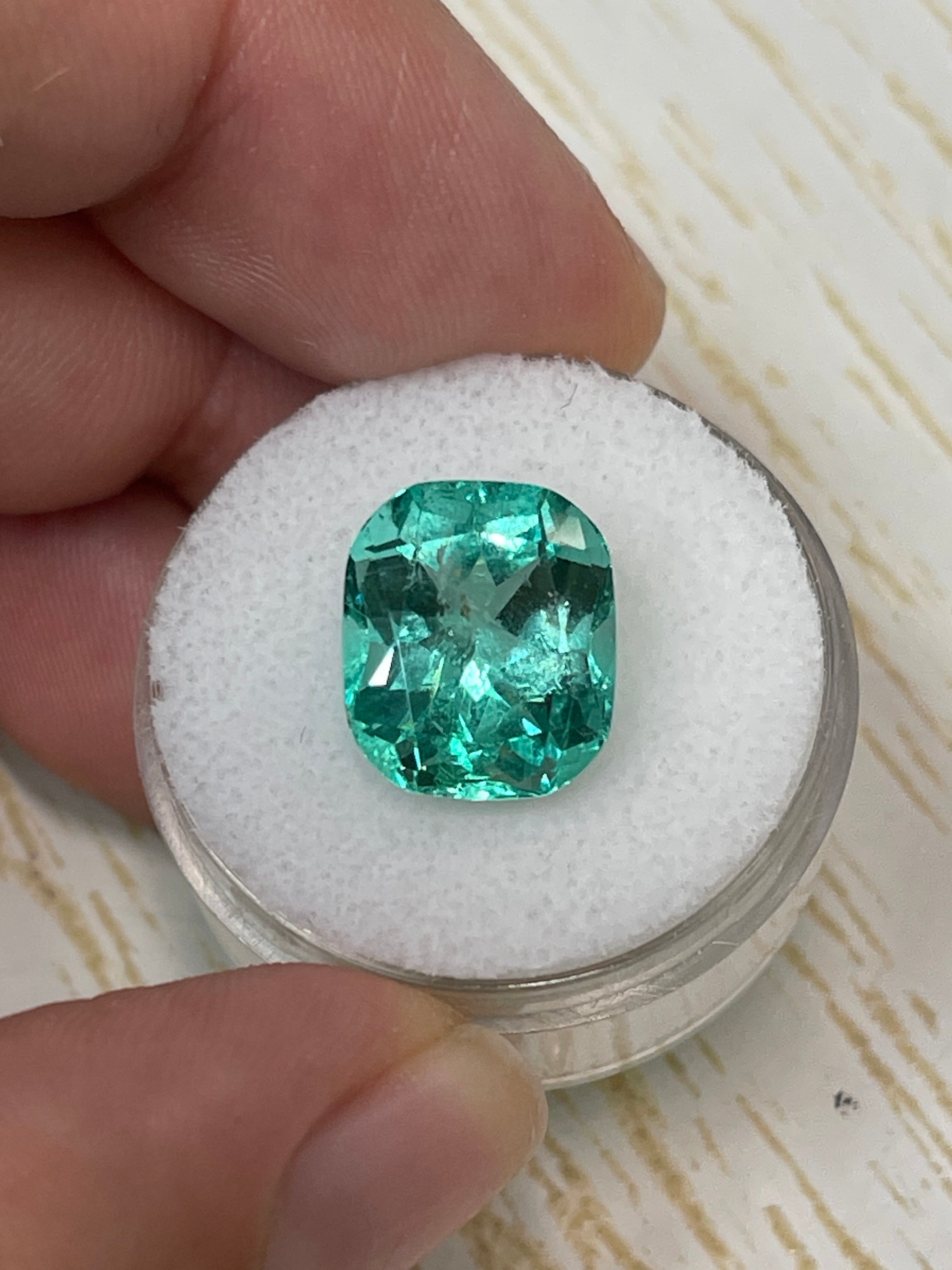 7.13 carat bluish green natural Colombian emerald loose cushion cut gemstone from JR Colombian Emeralds.