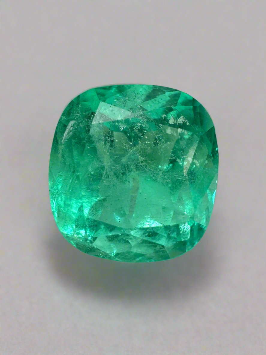Medium bluish green 7.28 carat Colombian emerald in cushion cut, natural loose gemstone by JR Colombian Emeralds.