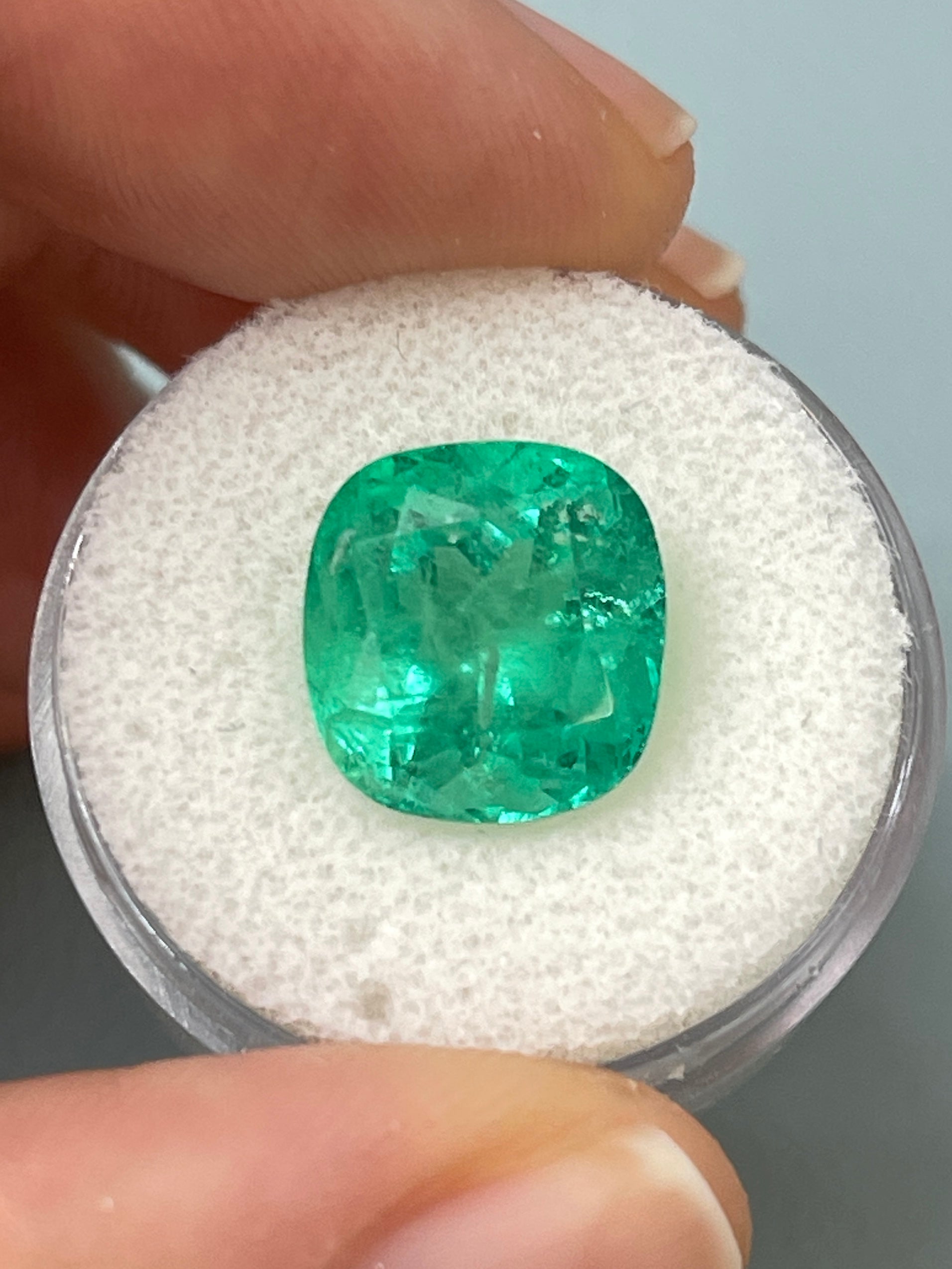 7.28 Carat medium bluish green Colombian emerald loose cushion cut gemstone from JR Colombian Emeralds.