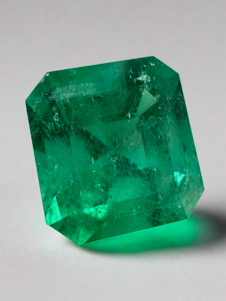 7.40-carat Muzo intense green natural Colombian emerald loose Asscher cut gemstone by JR Colombian Emeralds.