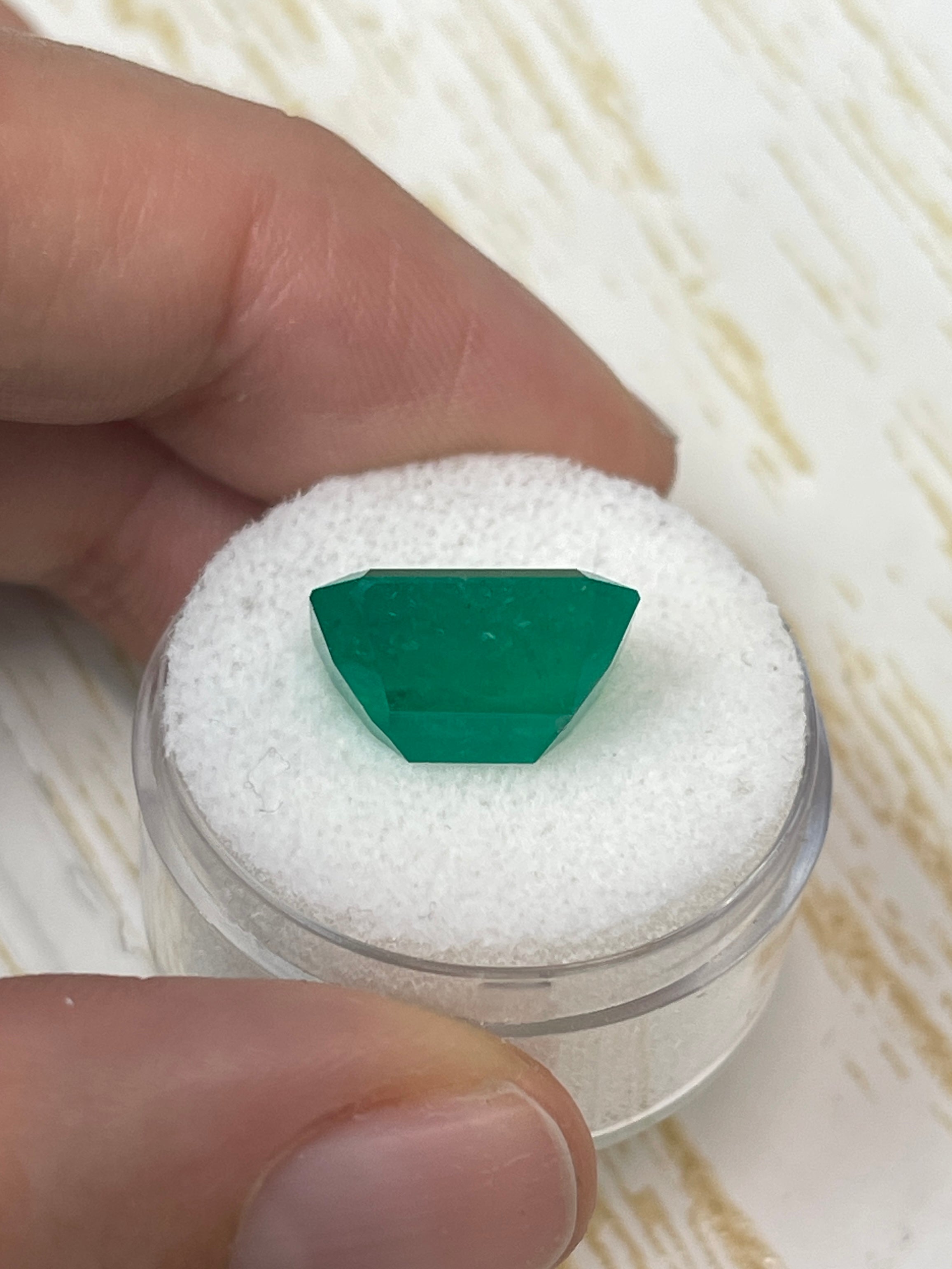 Deep forest green Colombian emerald cut loose gemstone, 7.51 carats, 13.5x11 mm, from JR Colombian Emeralds.