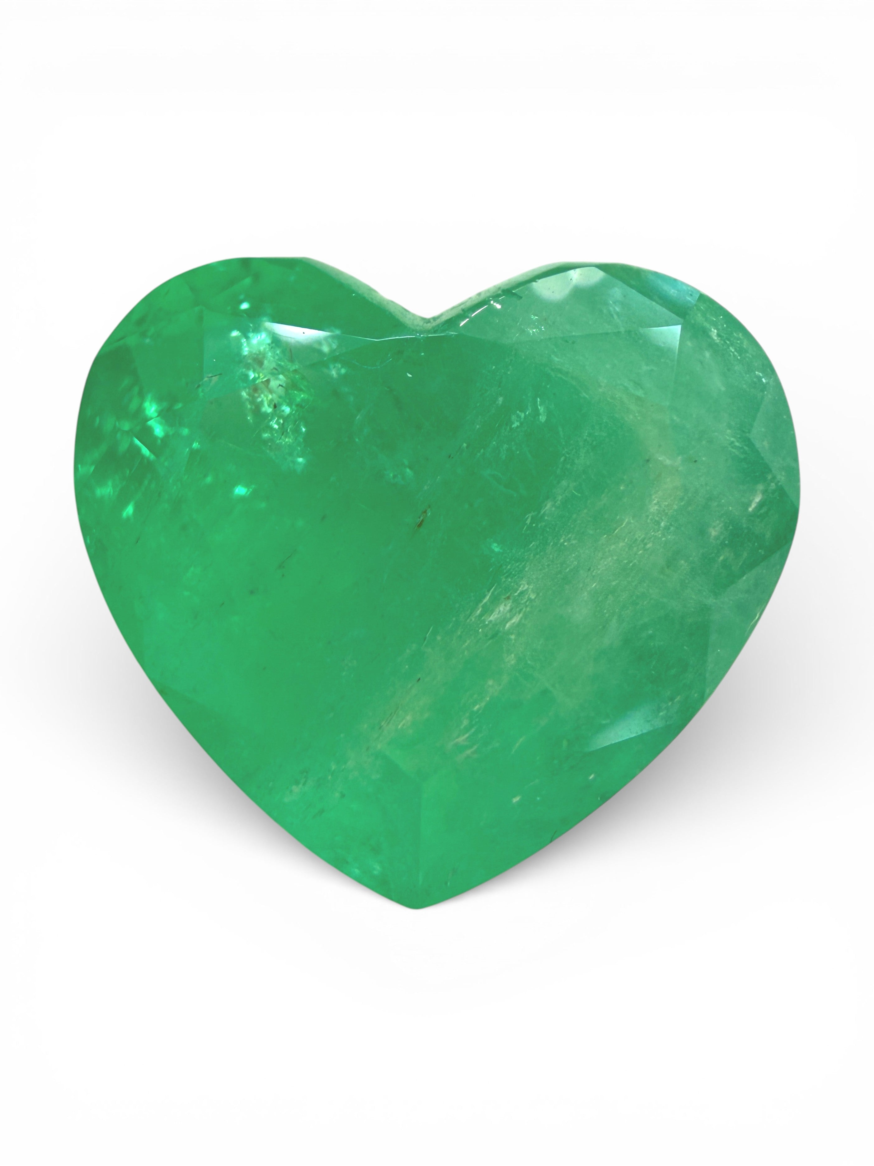7.68-carat natural Colombian emerald loose gemstone, heart cut with earthy green color, from JR Colombian Emeralds.