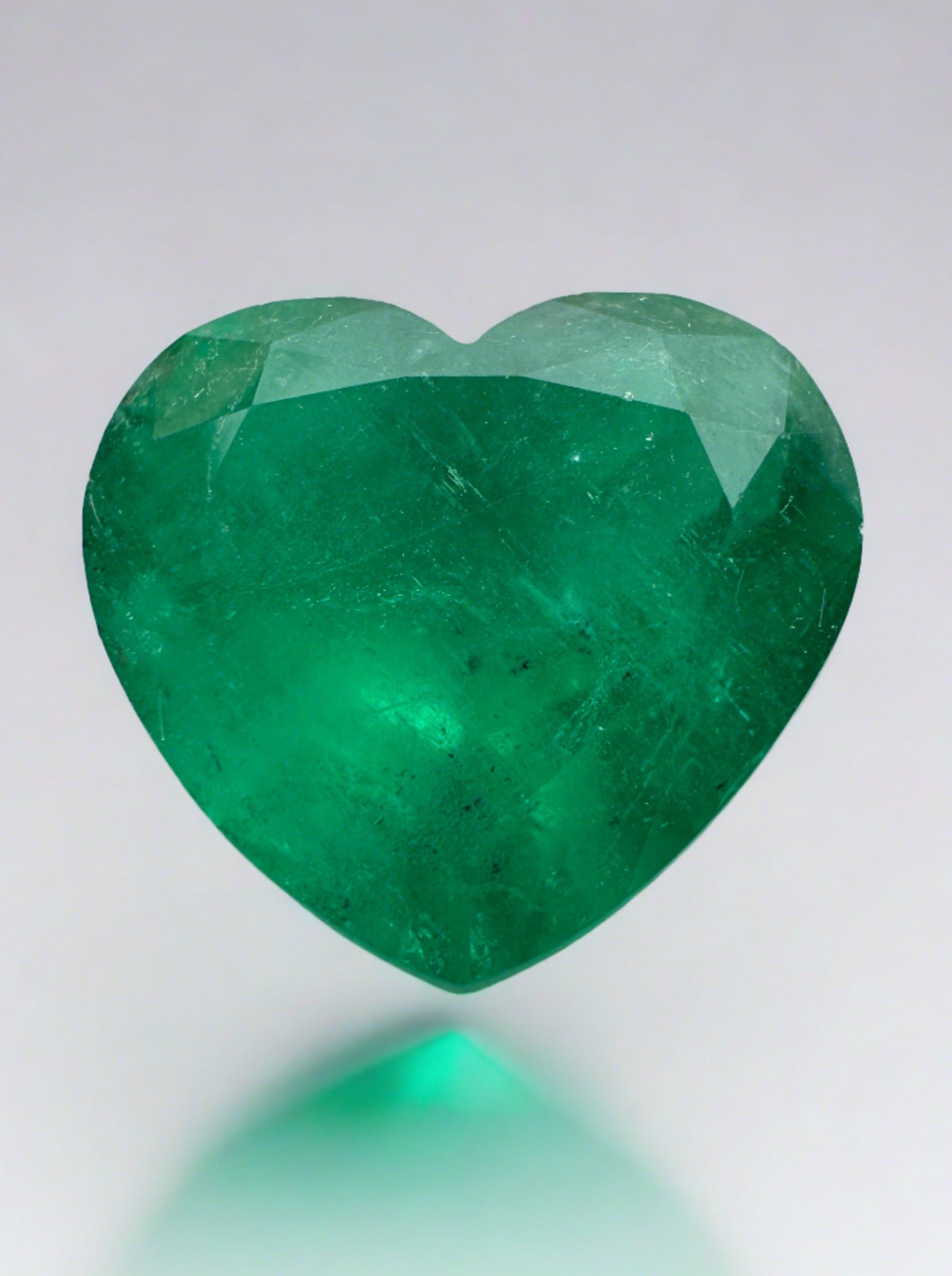7.68 carat natural Colombian emerald loose gemstone, heart cut, forest green color, from JR Colombian Emeralds.