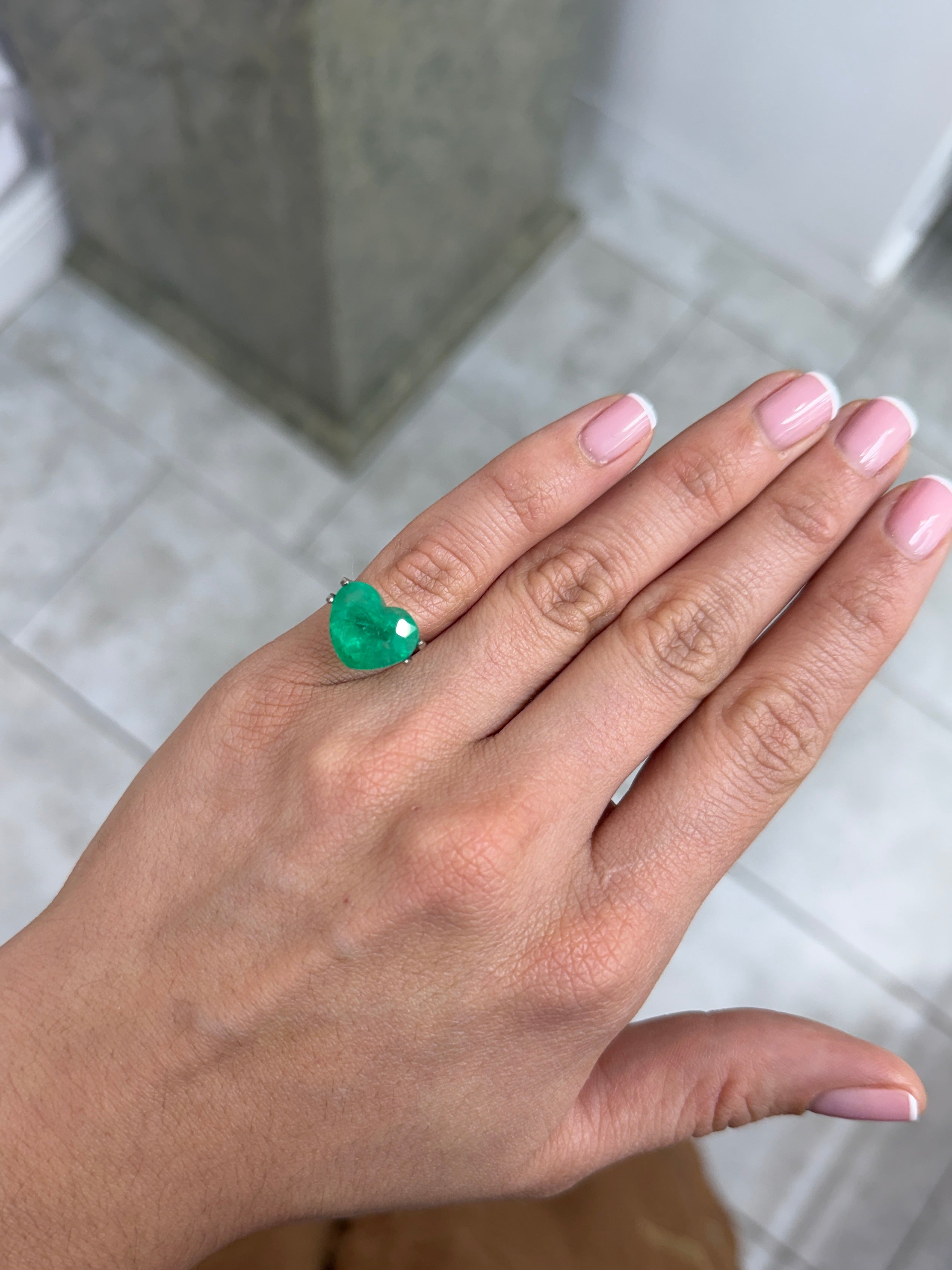 Large 8.47 carat natural Colombian emerald in heart cut, medium green, loose gemstone from JR Colombian Emeralds.