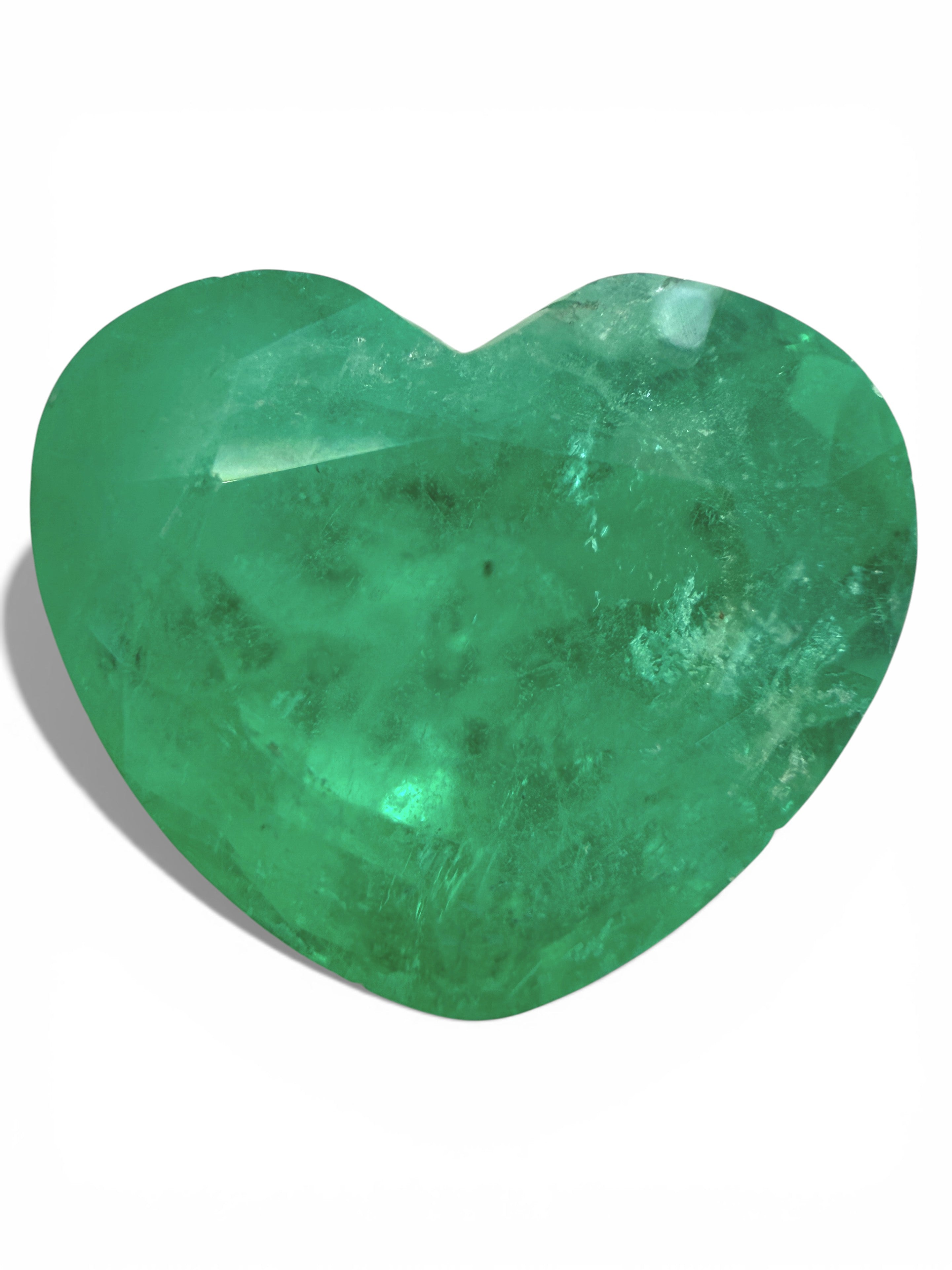 Large 8.47 carat medium green Colombian emerald in heart cut, loose natural gemstone, from JR Colombian Emeralds.