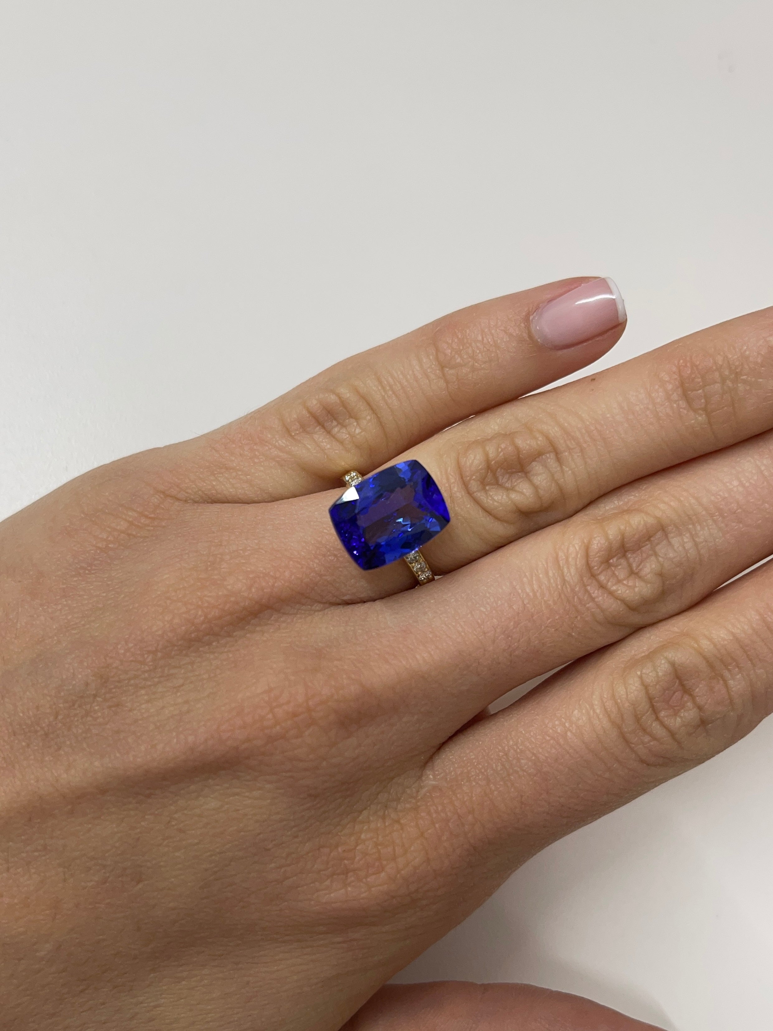 8.56 carat GIA-certified violetish blue Tanzanite loose cushion cut gemstone from JR Colombian Emeralds.