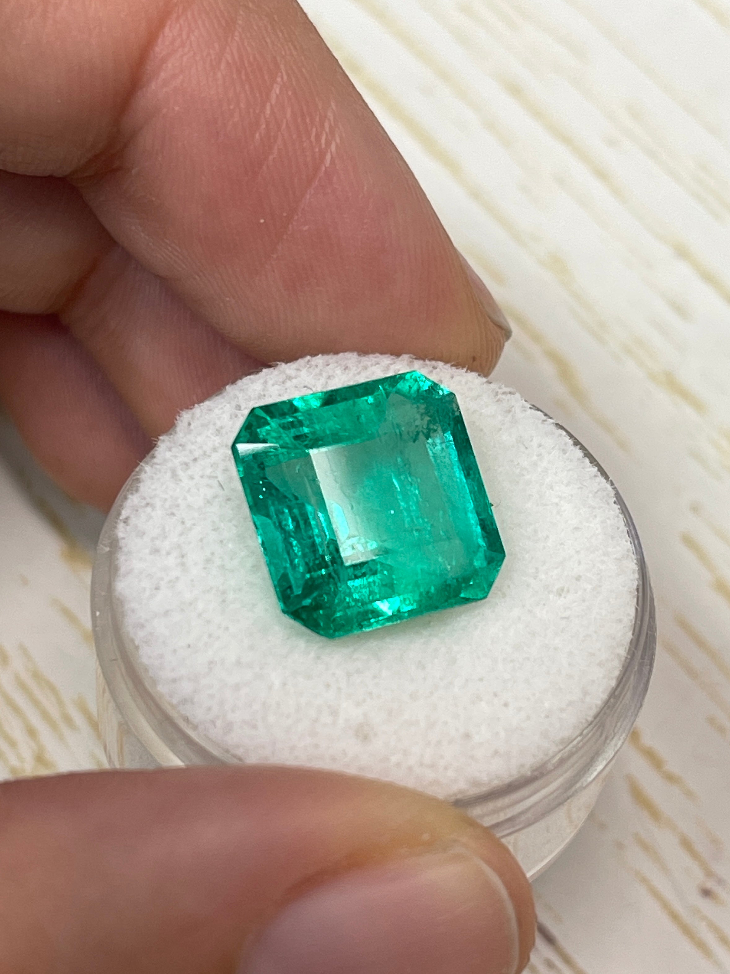 8.81 carat glowing green natural Colombian emerald in Asscher cut, loose gemstone, vibrant and radiant from JR Colombian Emeralds.