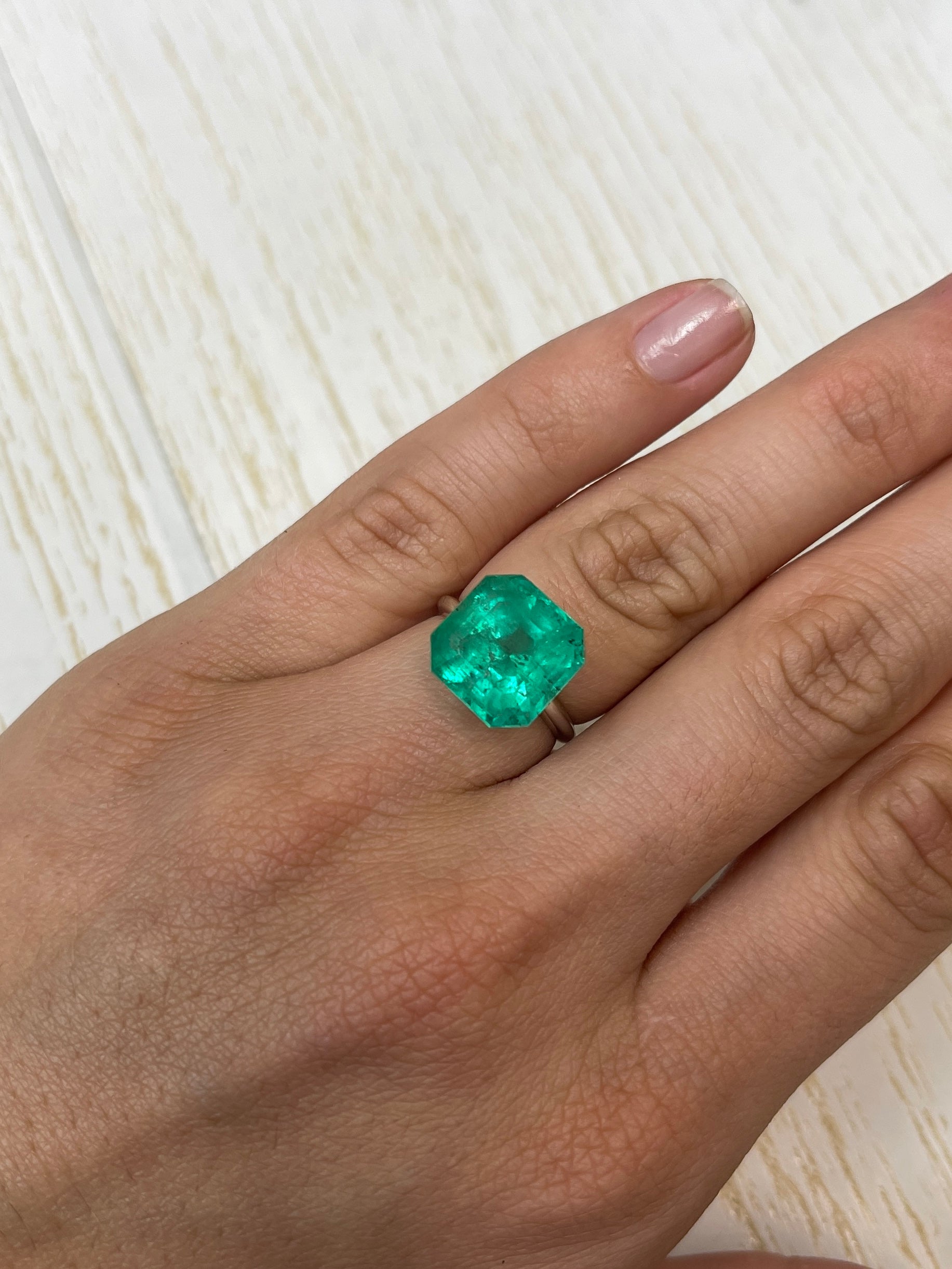 Large 9.03 carat green Colombian emerald loose gemstone, Asscher cut, natural and vibrant from JR Colombian Emeralds.