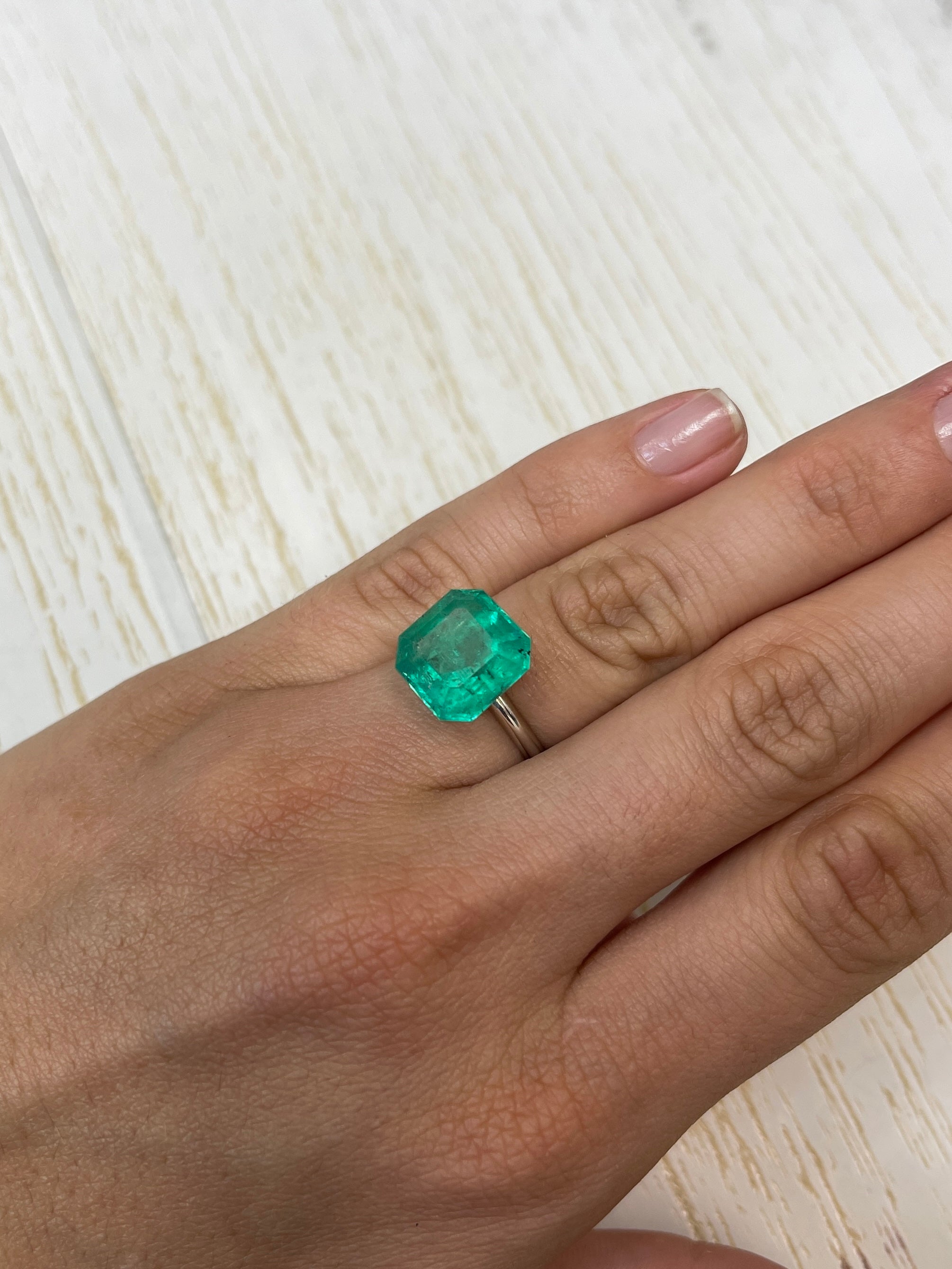 Huge 9.03 carat green Colombian emerald loose stone, Asscher cut, natural and vibrant, from JR Colombian Emeralds.