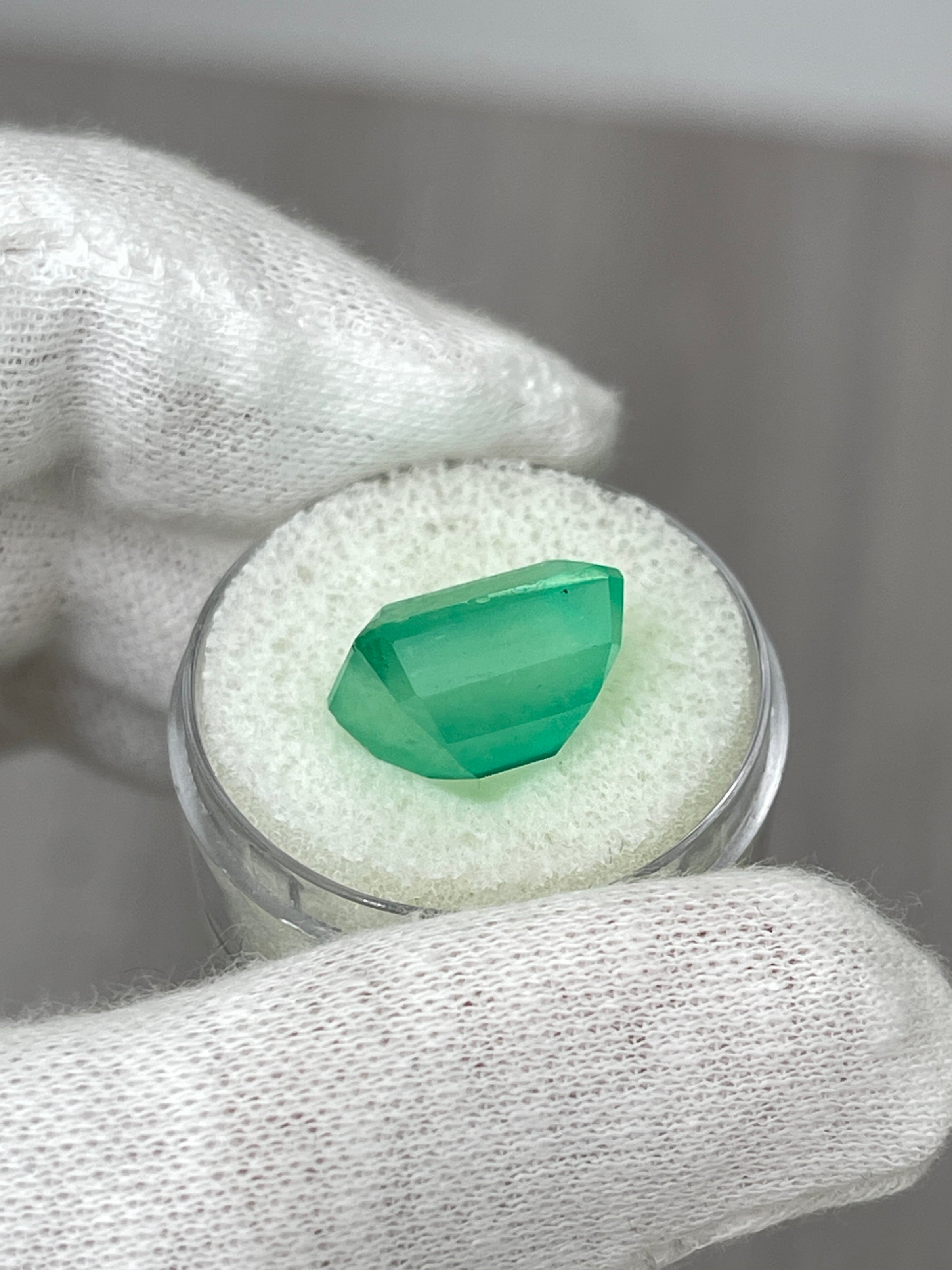 Medium green Colombian emerald cut loose gemstone, 9.29 carats, 13x10mm, earthy tone from JR Colombian Emeralds.