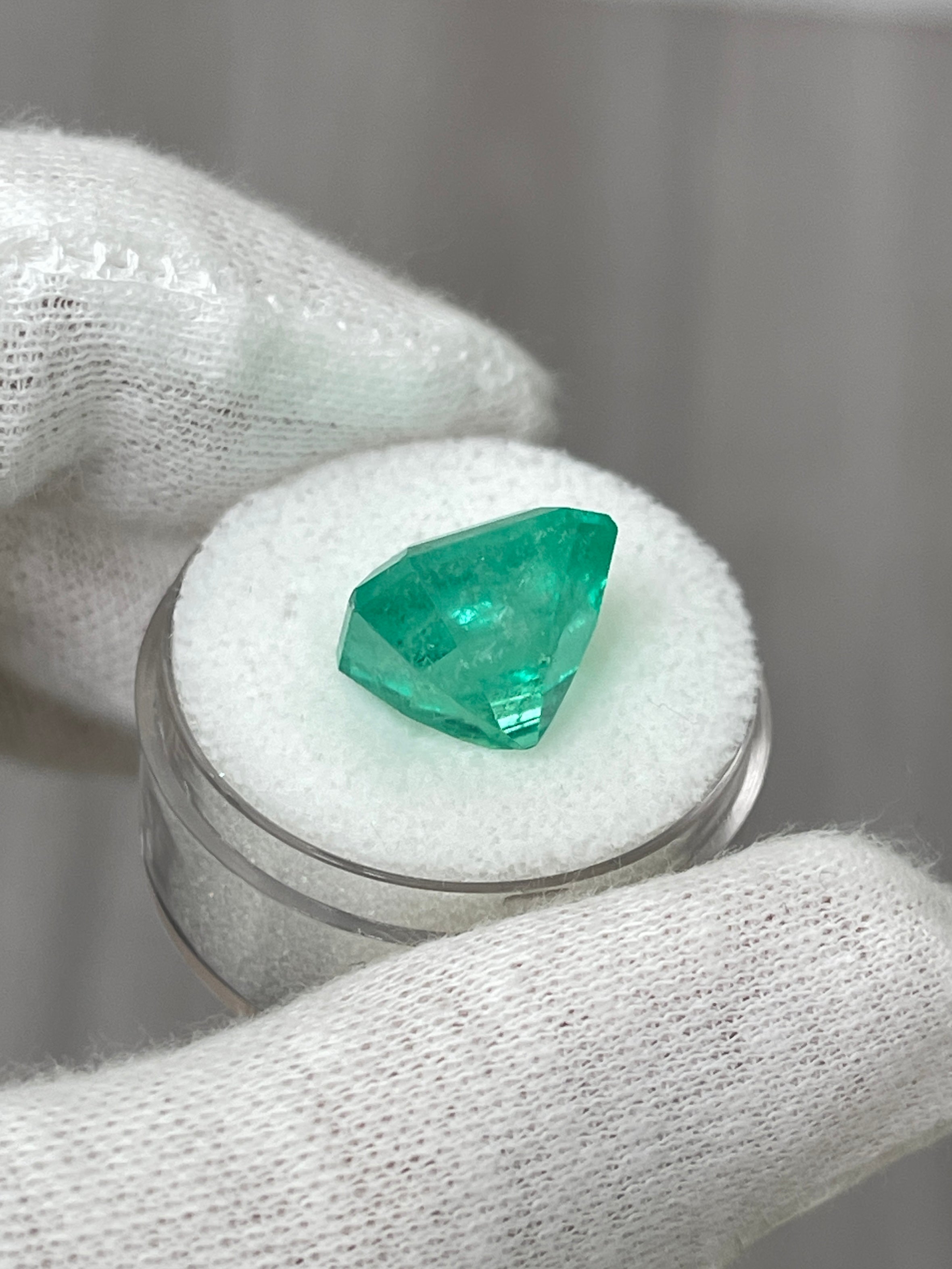 Medium green 9.79 carat Colombian emerald loose gemstone in an Asscher cut, from JR Colombian Emeralds.