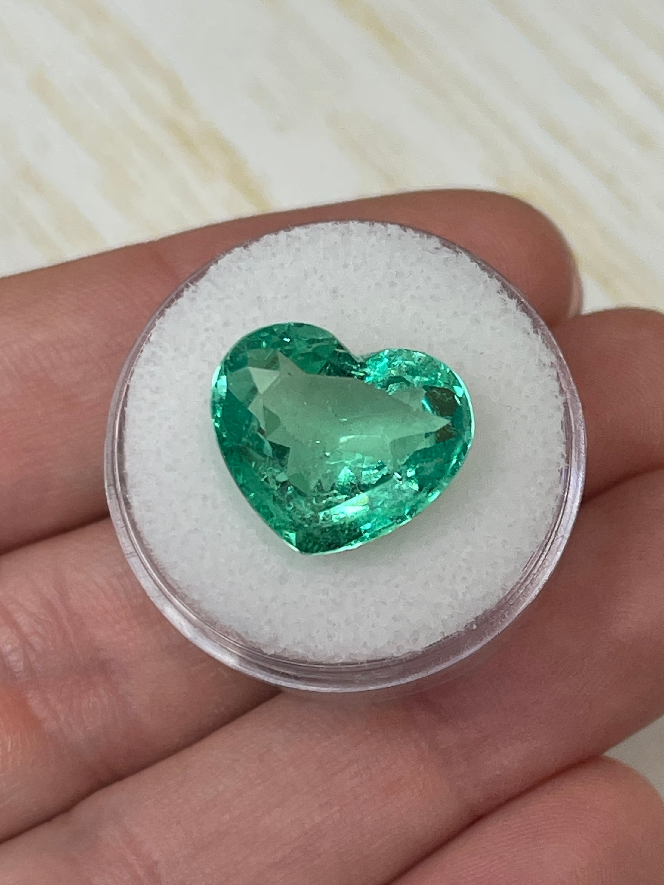 9.84-carat natural Colombian emerald, 13x16mm heart cut, bubbly eye-clean loose gemstone from JR Colombian Emeralds.