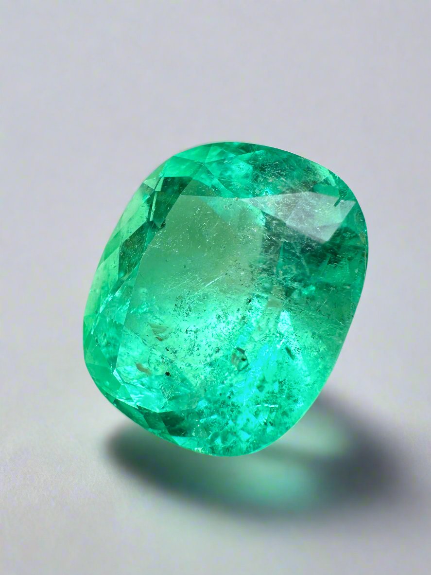 Natural 9.89 carat spring green Colombian emerald in cushion cut, loose gemstone with vibrant color and clarity.