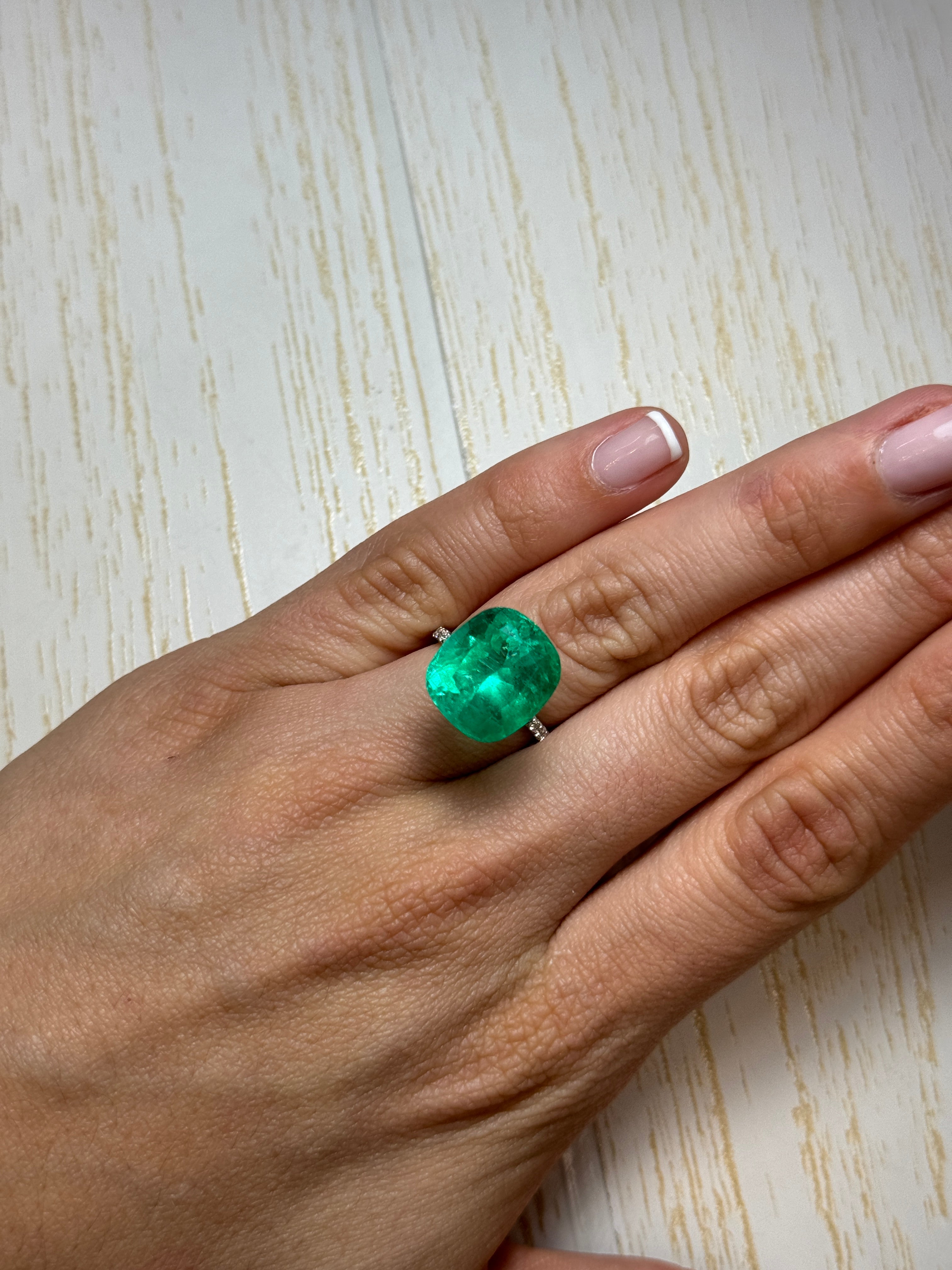 Large 12.50 carat green Colombian emerald loose cushion cut gemstone from JR Colombian Emeralds.