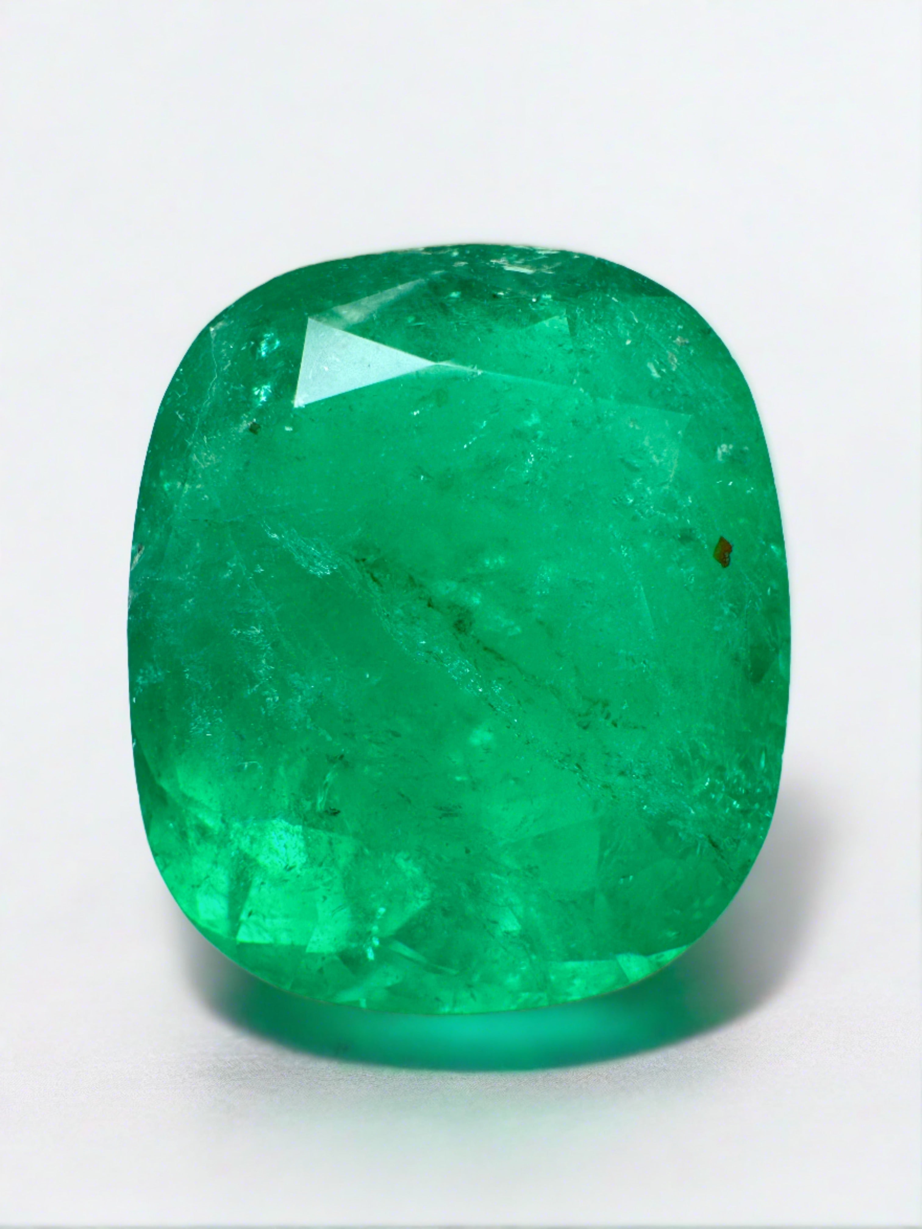 Large 12.81 carat natural Colombian emerald cushion cut gemstone with vibrant green color, from JR Colombian Emeralds.